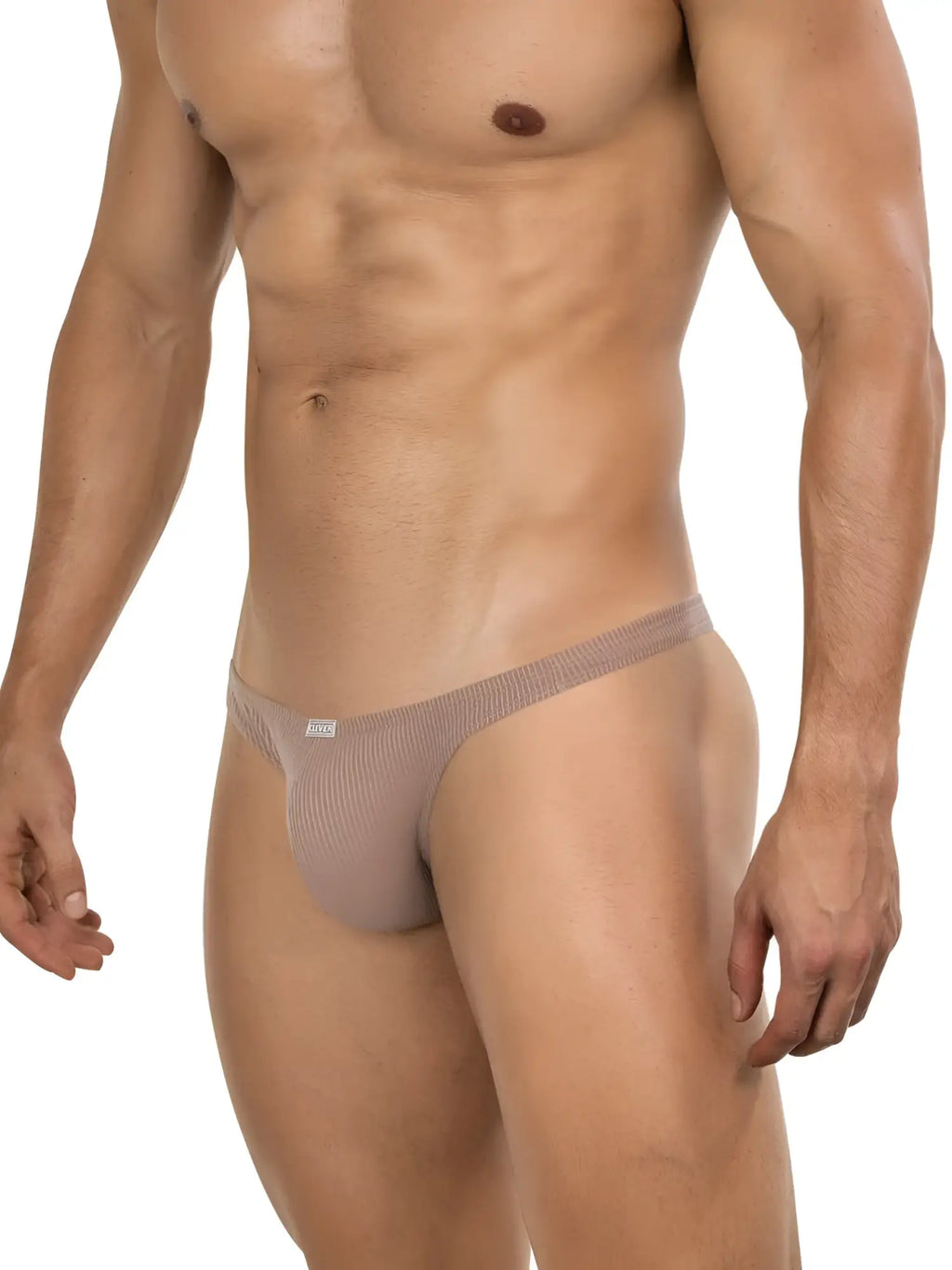 Clever 26021 Apolo Thong in sand color, front view on a model.