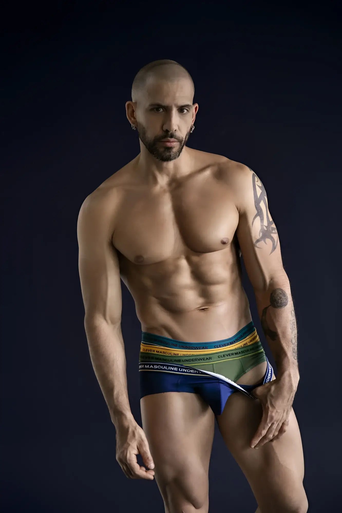 Men’s Clever 519969 Australian Latin briefs with bold green yellow and blue striped waistband in blue petrol and green colors