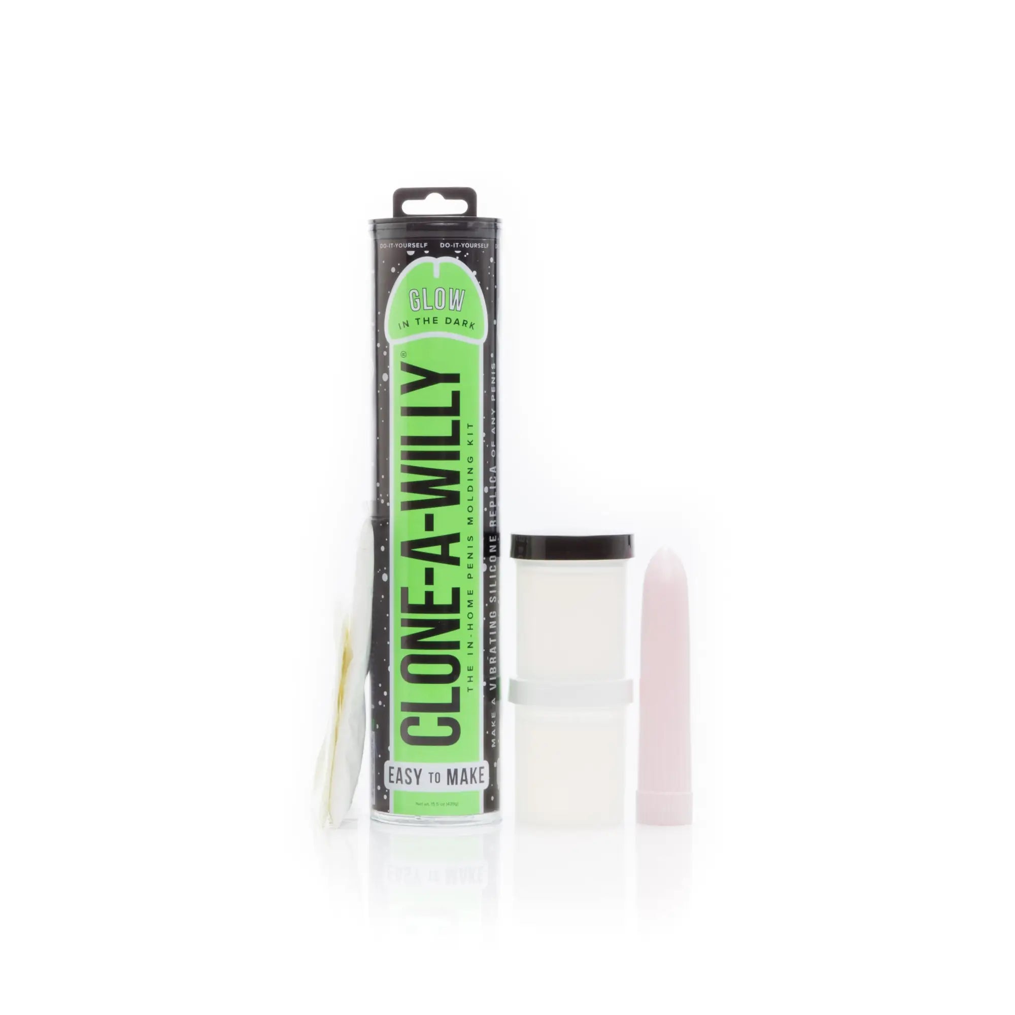 Green and black cylindrical package of clone a willy glow green silicone penile molding kit with glow in the dark feature