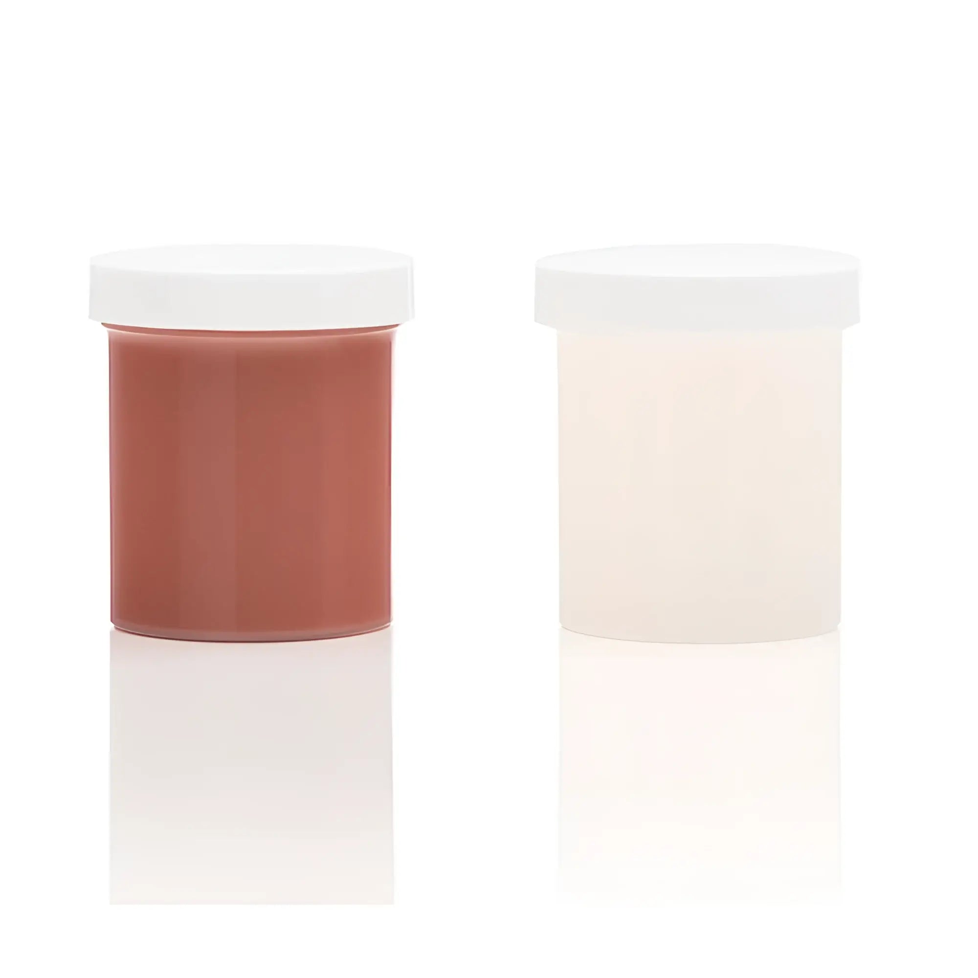Two translucent plastic jars with silicone refill medium skin tone terracotta and cream substances in clone a willy kit
