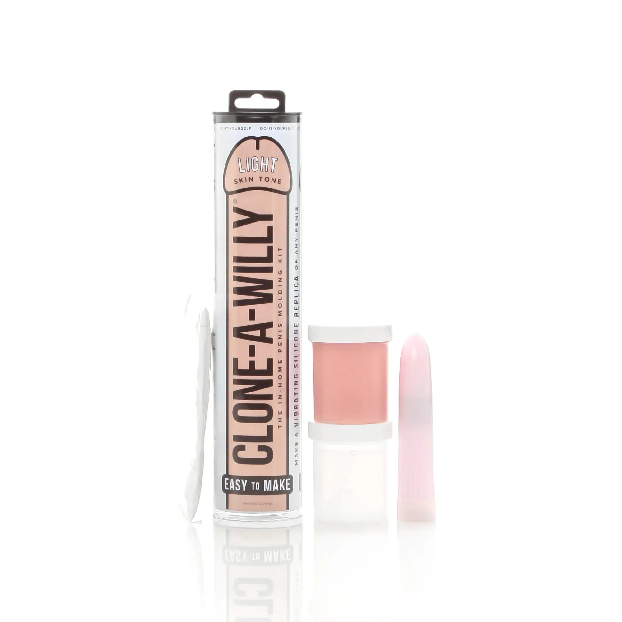 A pink silicone vibrating penis replica kit in clear tube packaging labeled clone a willy light skin tone