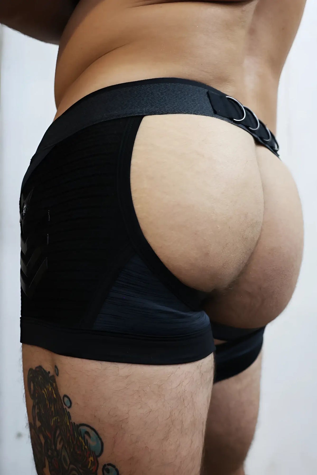 Black athletic briefs cockpit chock with supportive contoured design and reinforced side panels for enhanced comfort