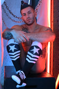 Cockpit socks black and white striped knee-high socks with a prominent star design on the upper leg