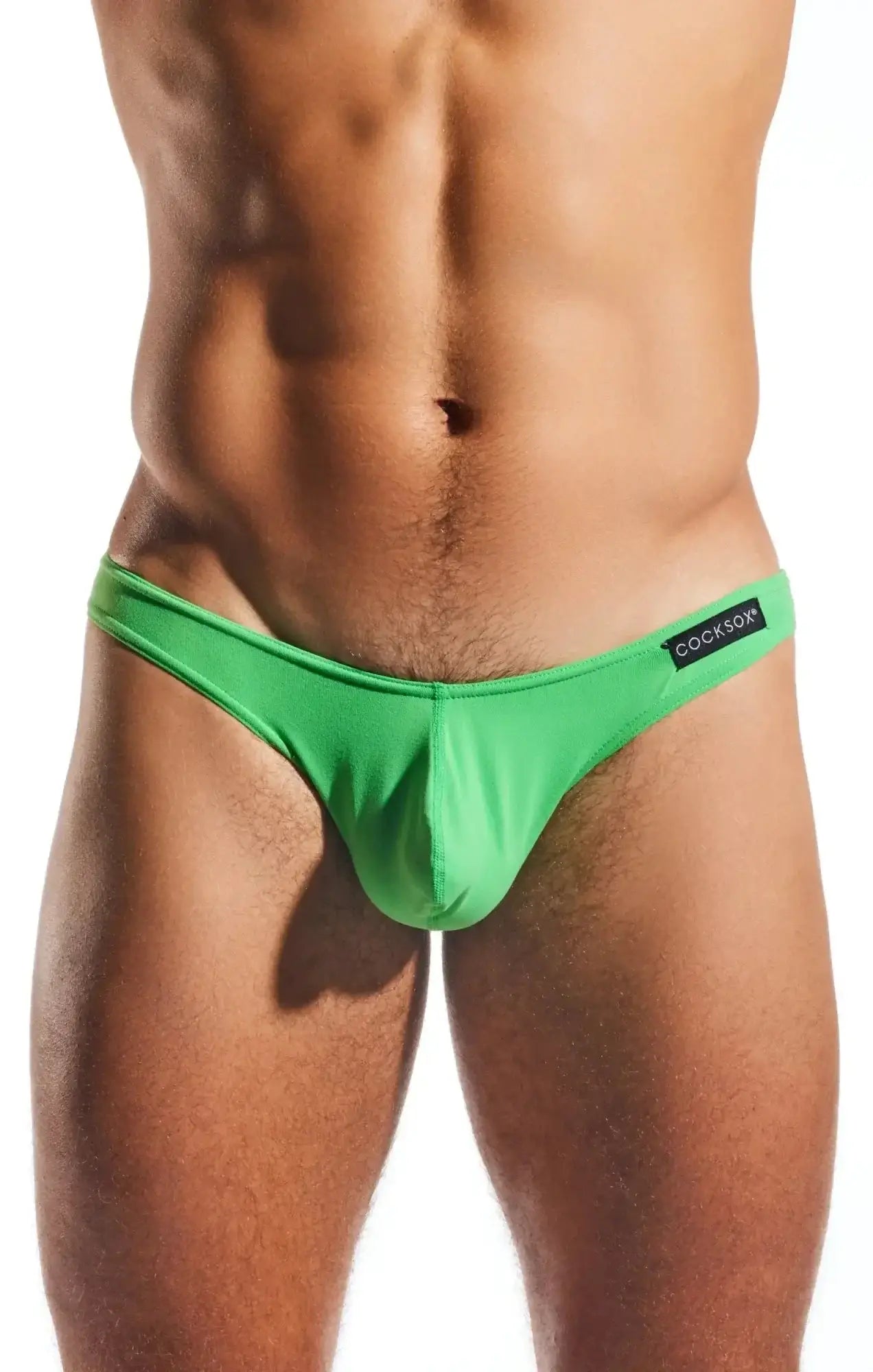 Bright green form-fitting thong brief with black cocksox brand label on waistband cocksox cx01 brief