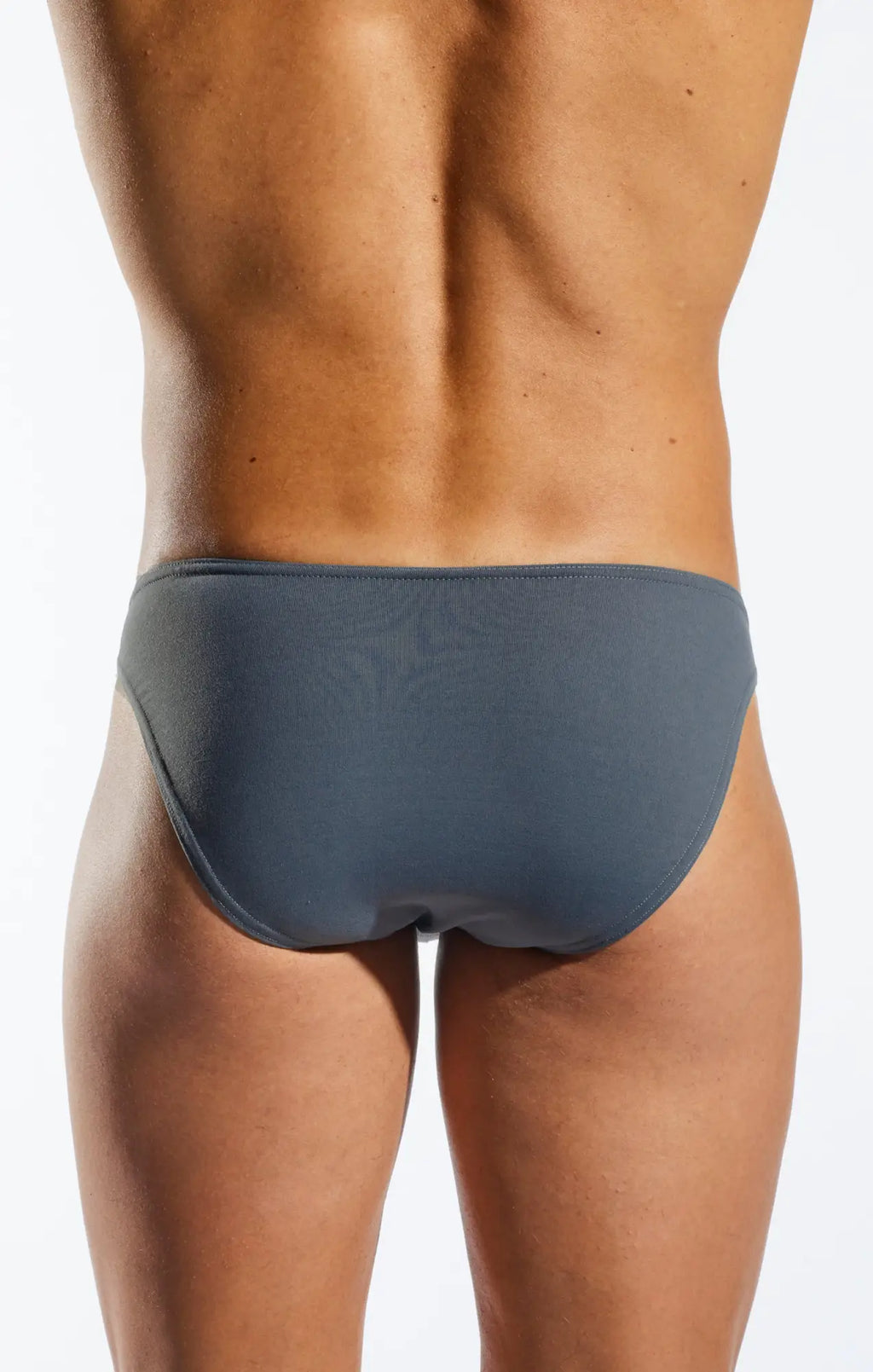 Back view of gray cocksox cx01 brief with smooth form-fitting fabric and subtle logo on the back