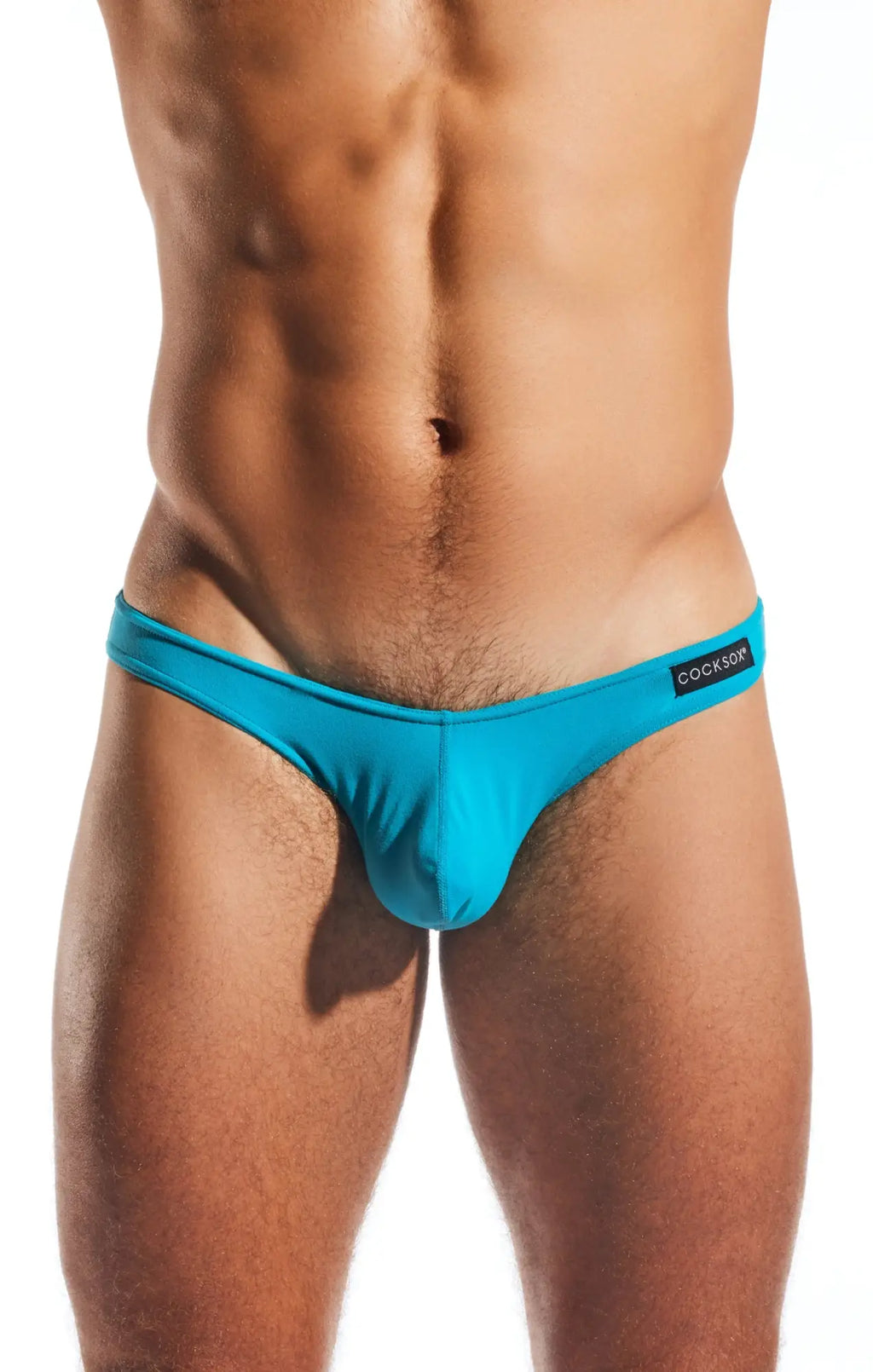 Turquoise cocksox cx01 brief thong made of stretchy fabric with a sleek form fitting design shown from the back