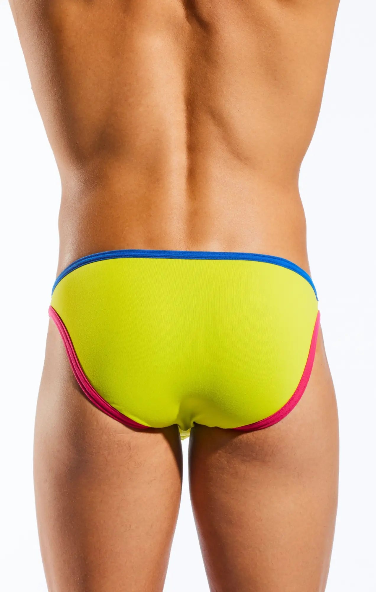 Vibrant neon yellow cocksox cx01bd brief swim trunks with bold blue and pink trim designed for comfortable swimwear use