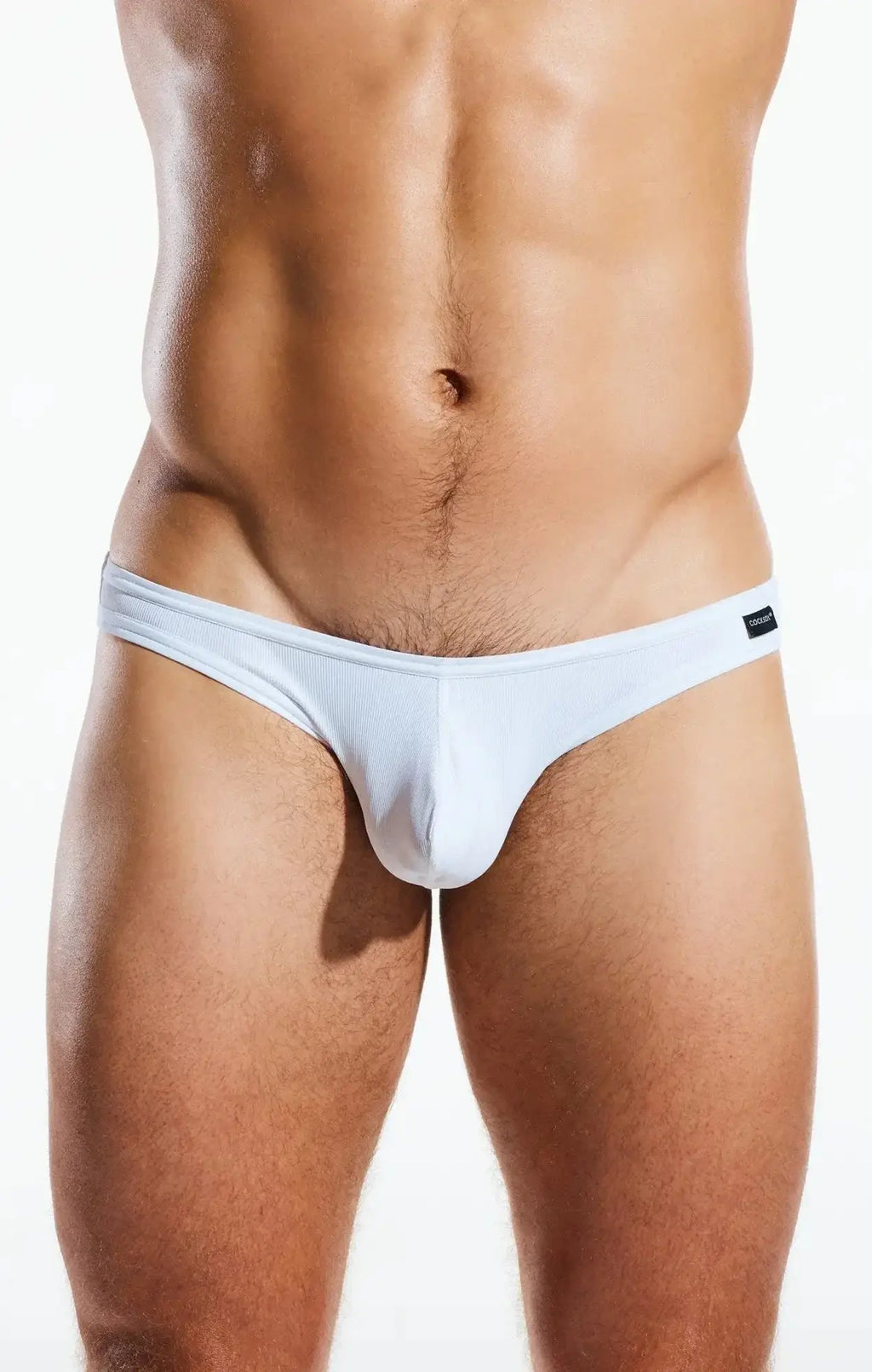 White cocksox cx01br thong made of smooth stretchy fabric with ribbed waistband shown from the back side