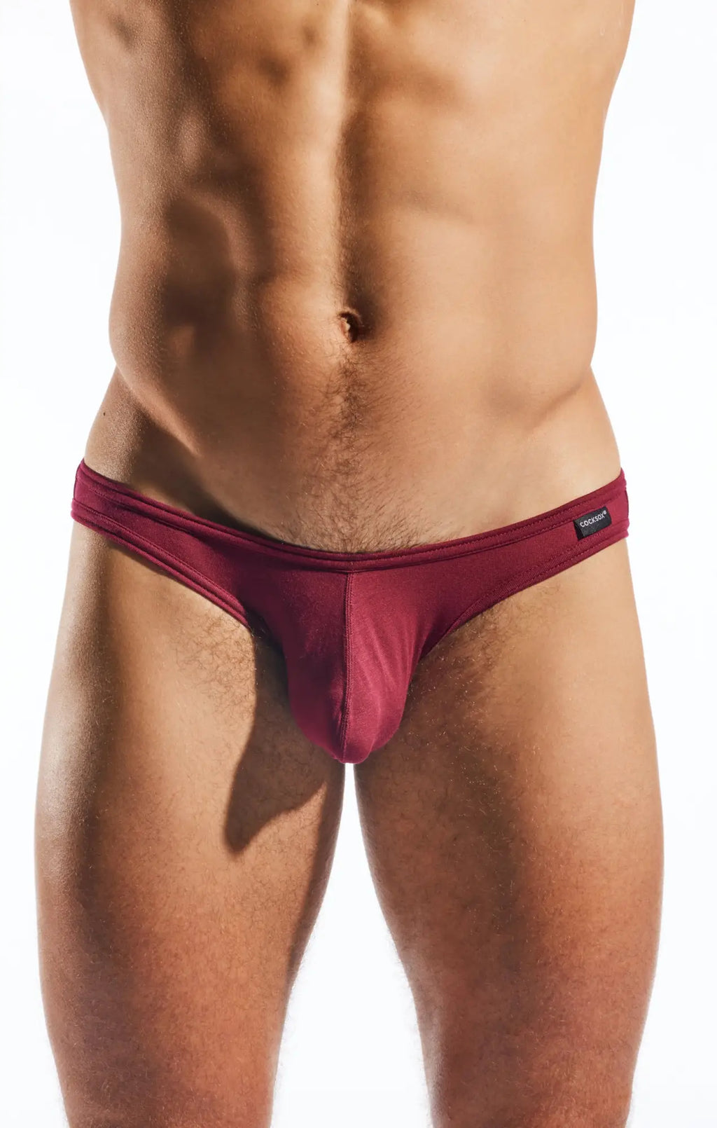 Maroon cocksox cx01md men’s briefs with smooth fabric and a black brand tag on the waistband