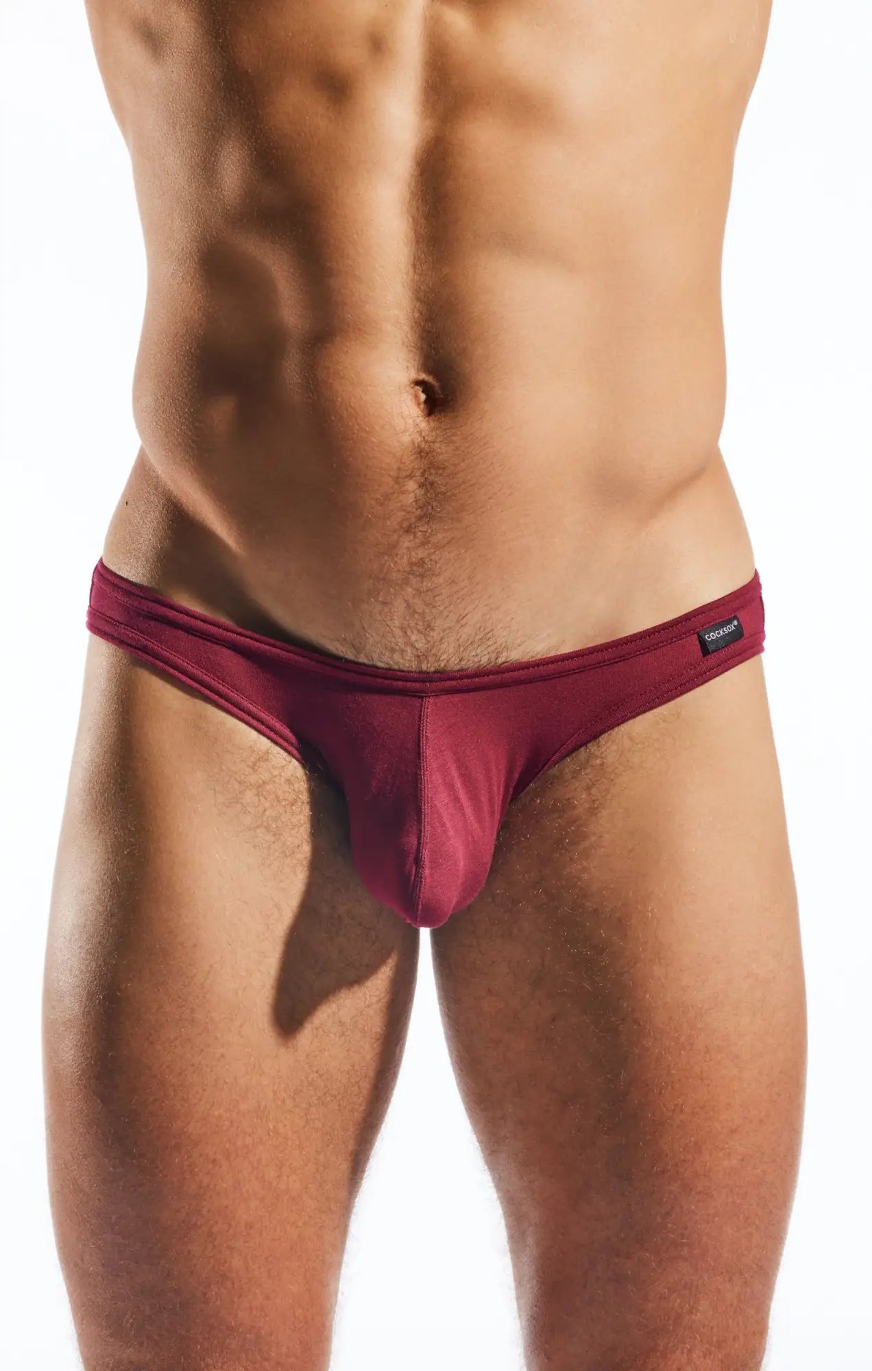 Maroon cocksox cx01md men’s briefs with smooth fabric and a black brand tag on the waistband