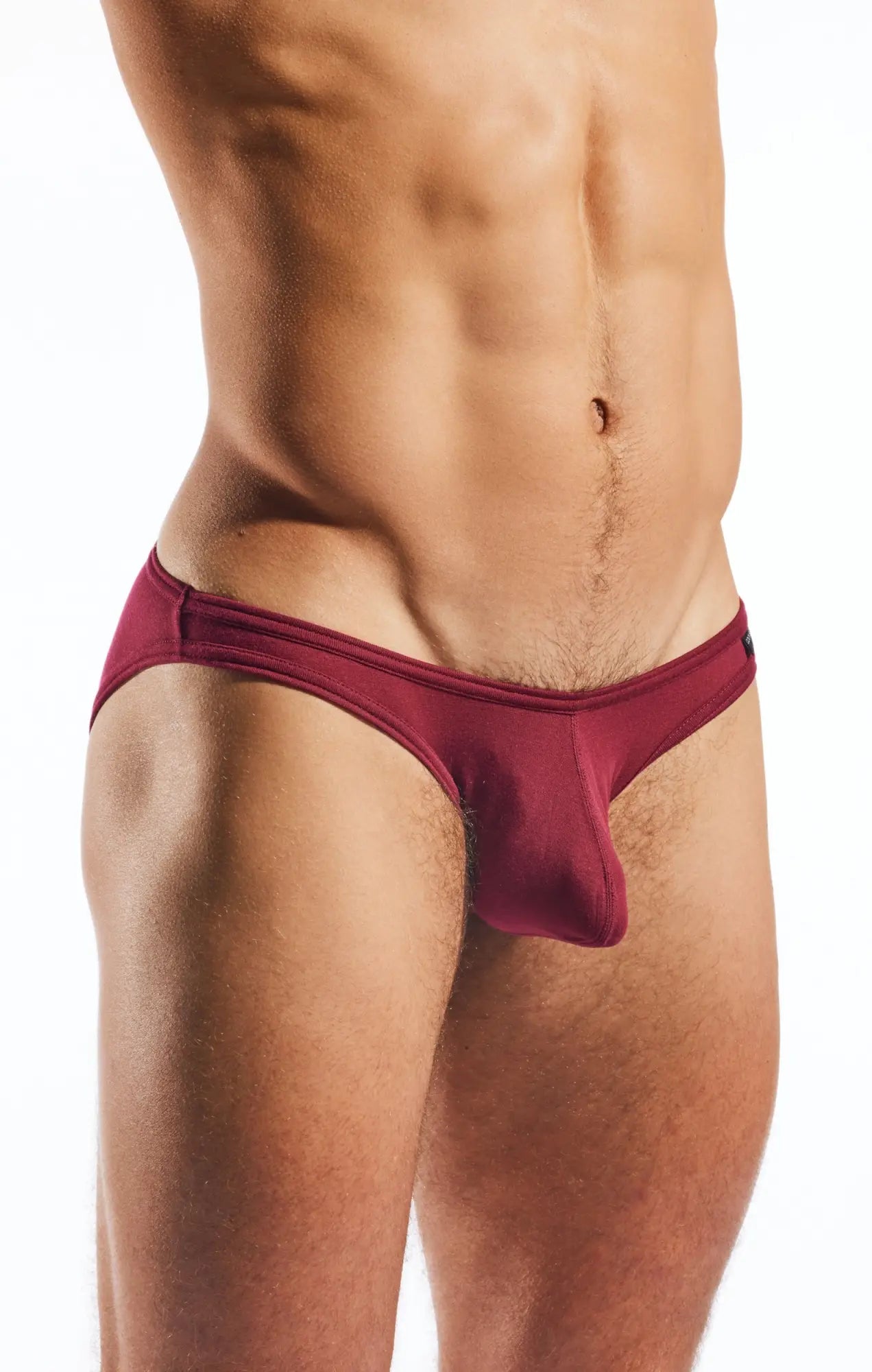 A sleek maroon cocksox cx01md brief with smooth form-fitting fabric and a subtle brand tag on the waistband