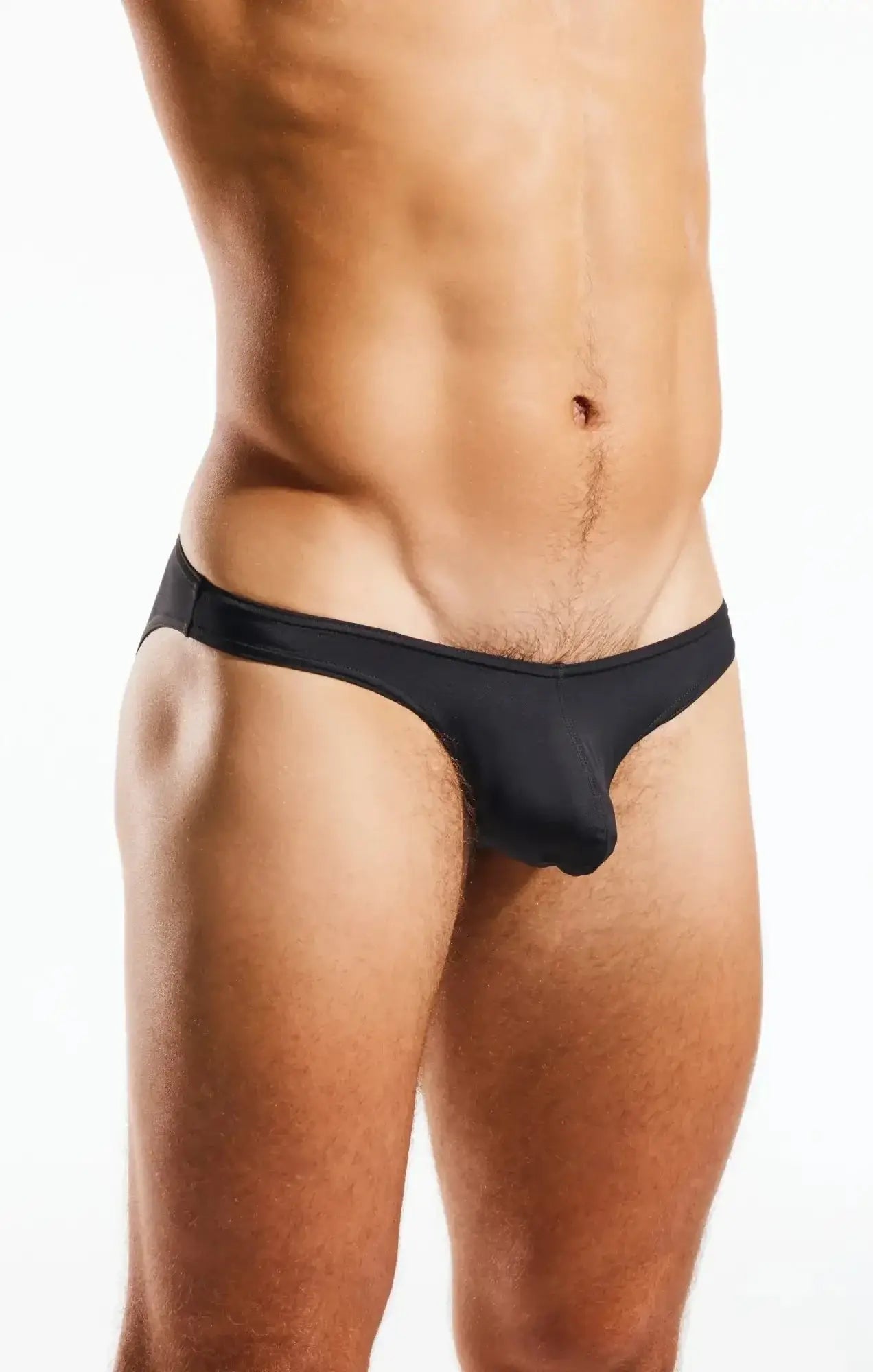 Black low-rise Cocksox CX02 swim brief made of smooth stretchy fabric with a form-fitting design