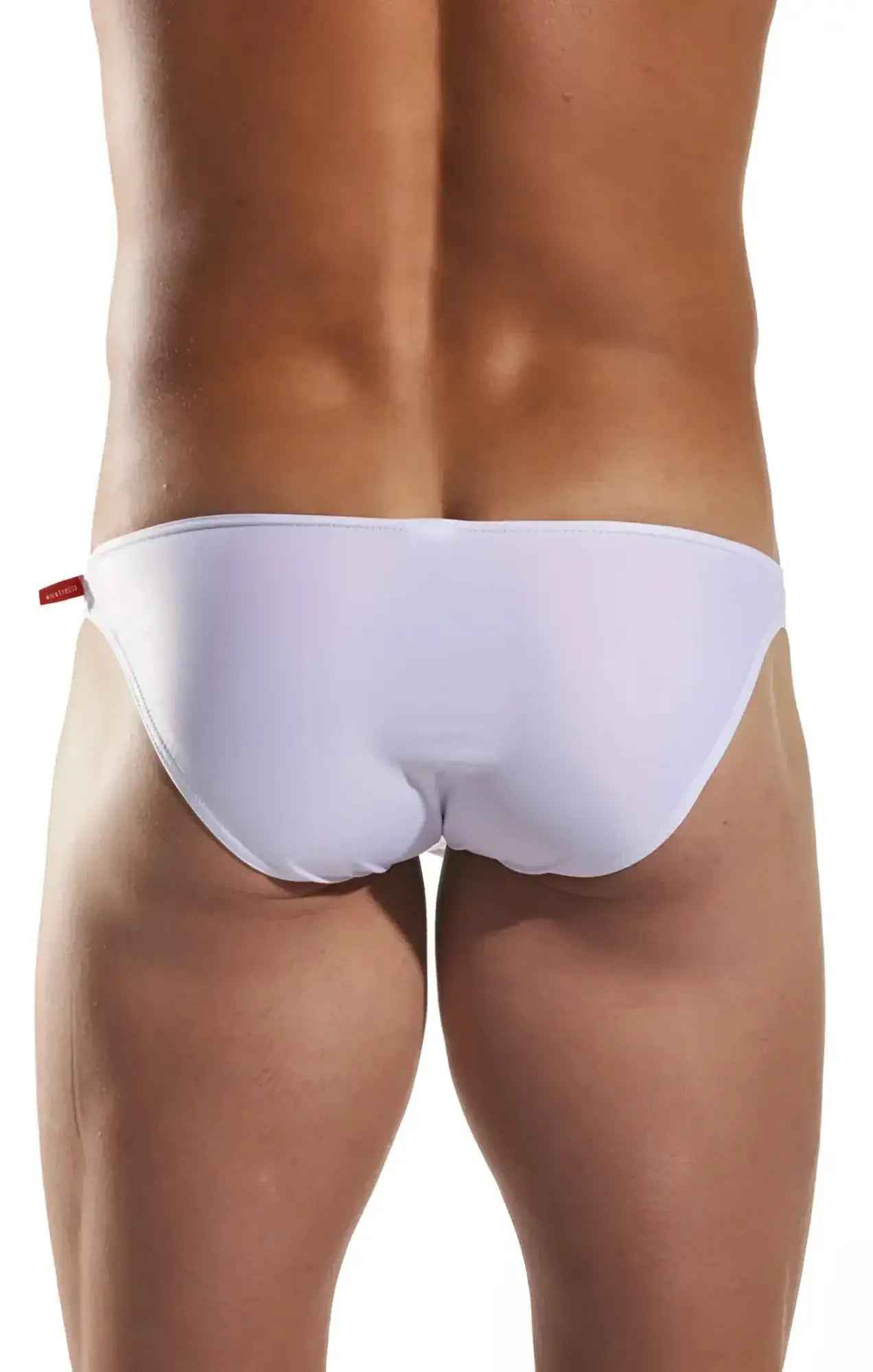 White sleek minimalist cocksox cx02 swim brief with subtle red side tag designed for swimming and beachwear