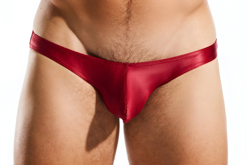 Red satin thong swim brief by cocksox cx02gs featuring sleek red satin fabric and minimal coverage for swimwear use
