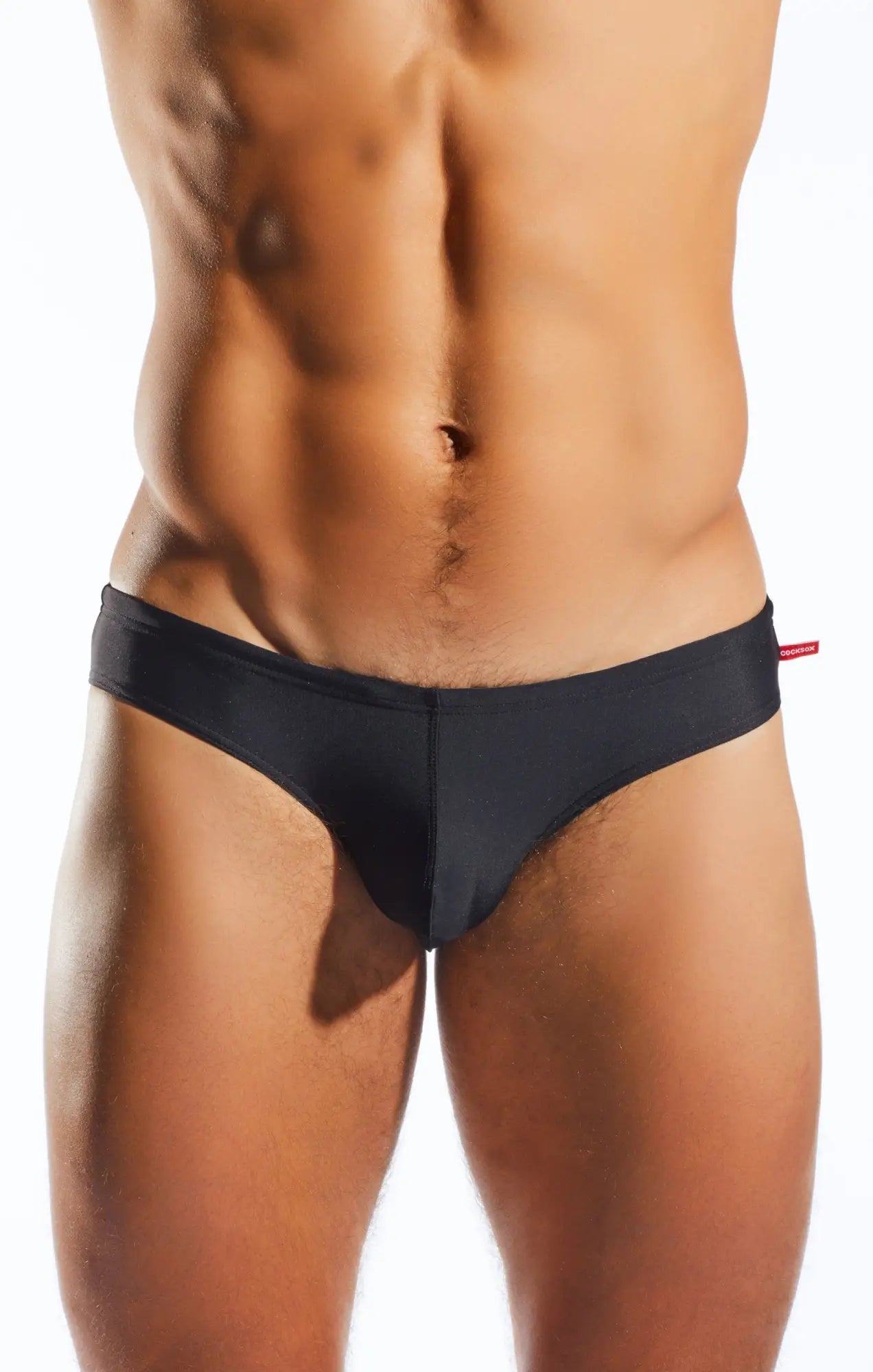 Black Cocksox CX04 drawstring swim brief with smooth form-fitting design and small red tag on waistband