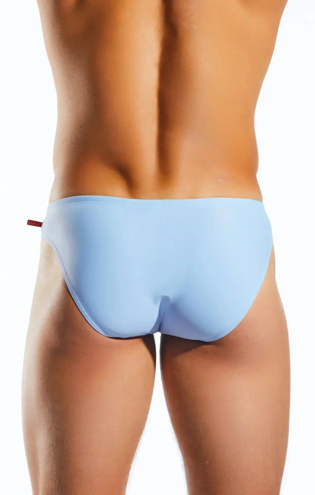 Light blue smooth textured Cocksox CX04 drawstring swim brief with a small red tab on the side