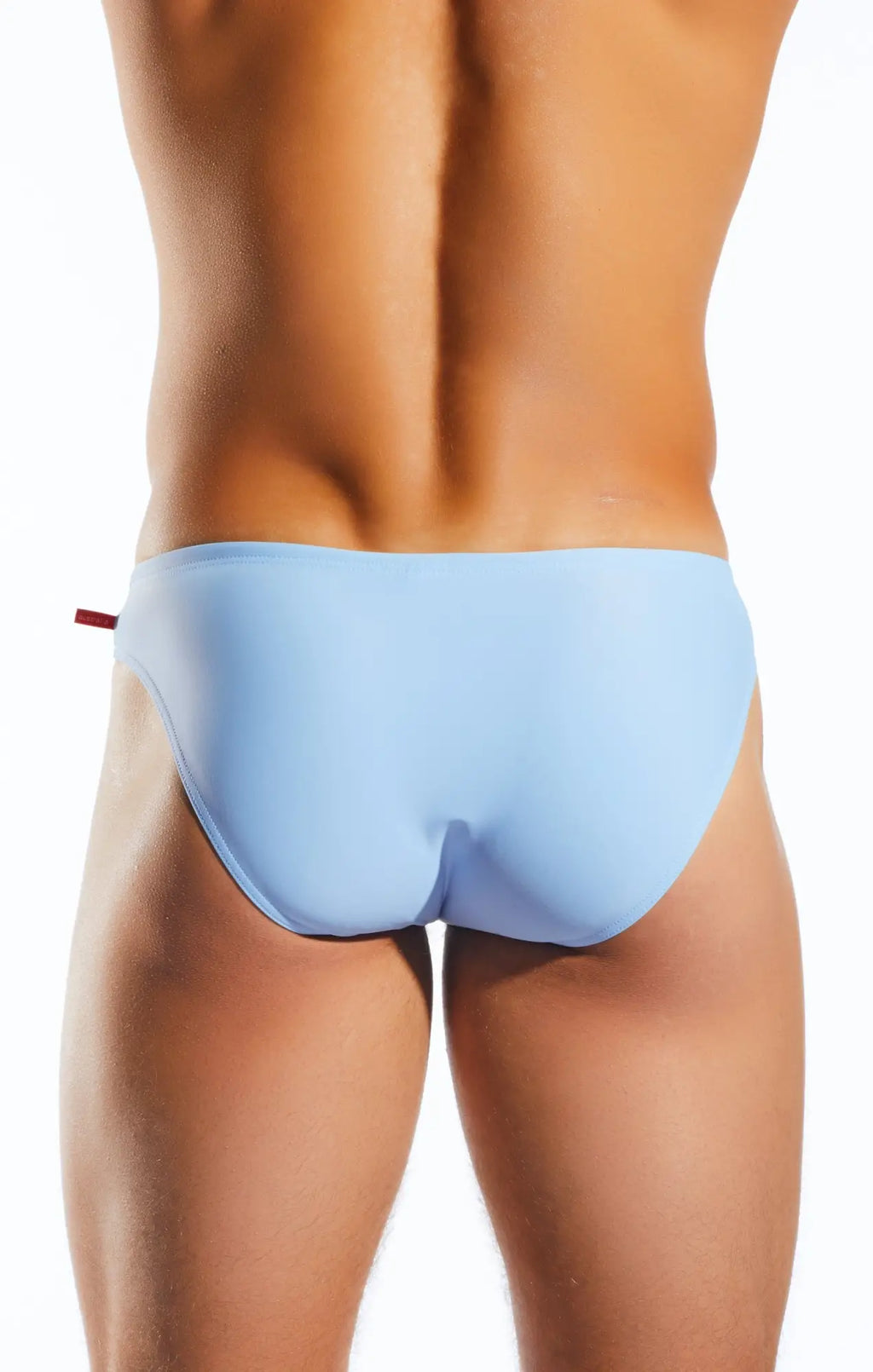 Light blue smooth textured Cocksox CX04 drawstring swim brief with a small red tab on the side