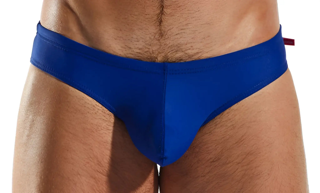 Royal blue seamless snug fit swim trunks with a small red tag on the waistband cocksox CX04 drawstring swim brief