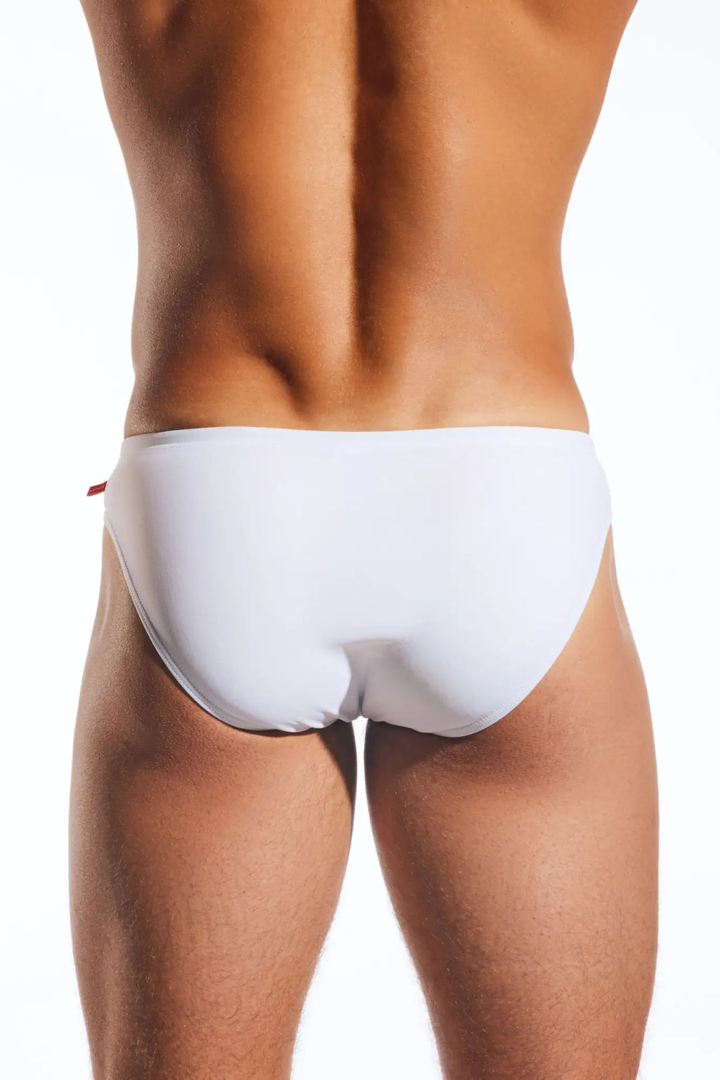 White cocksox cx04 drawstring swim brief with a subtle red tab on the side in brief style
