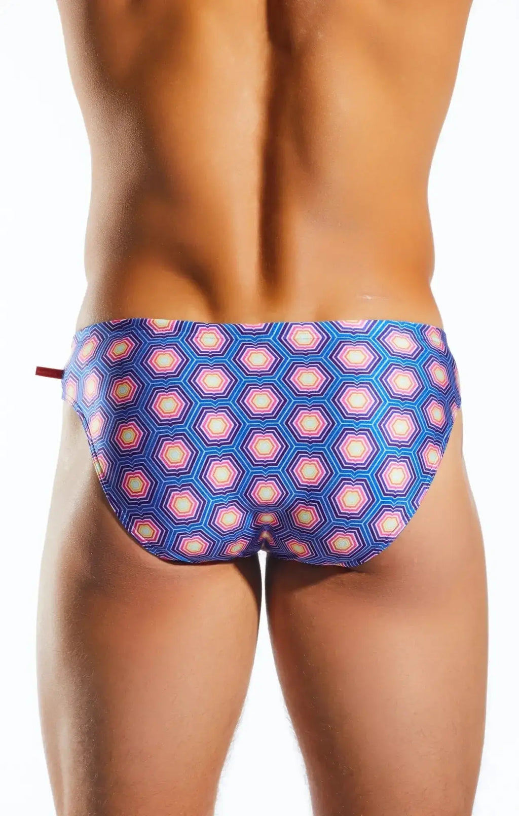 Cocksox CX04PR drawstring swim brief featuring blue and pink geometric hexagonal patterned swim trunks
