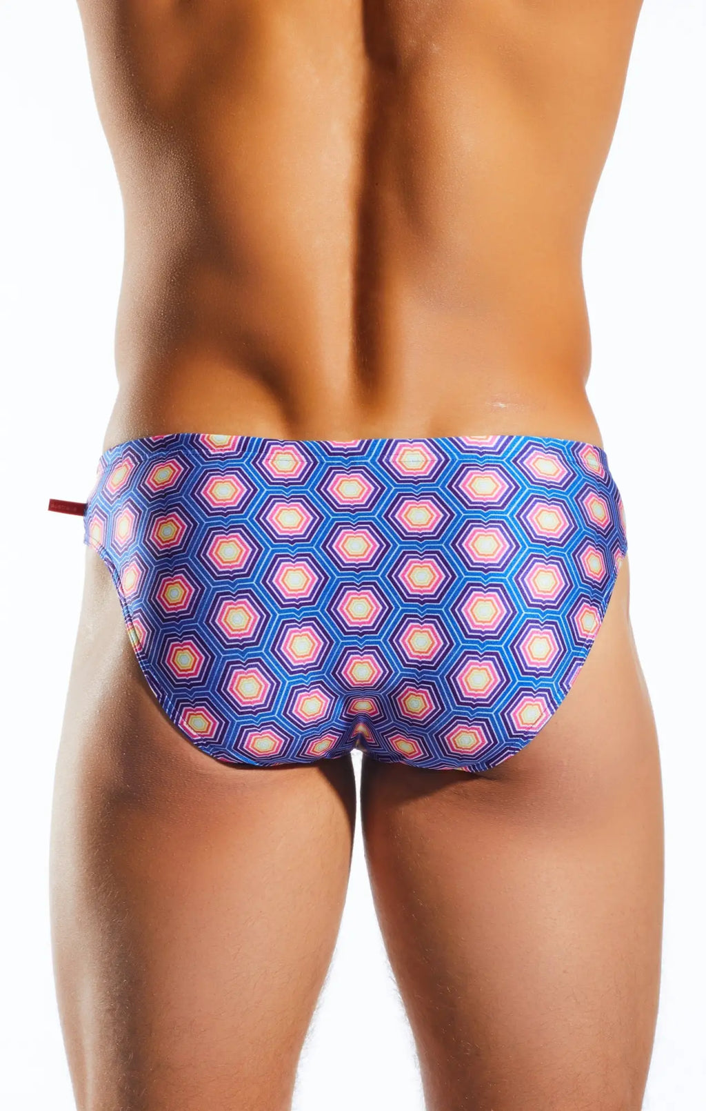 Cocksox CX04PR drawstring swim brief featuring blue and pink geometric hexagonal patterned swim trunks