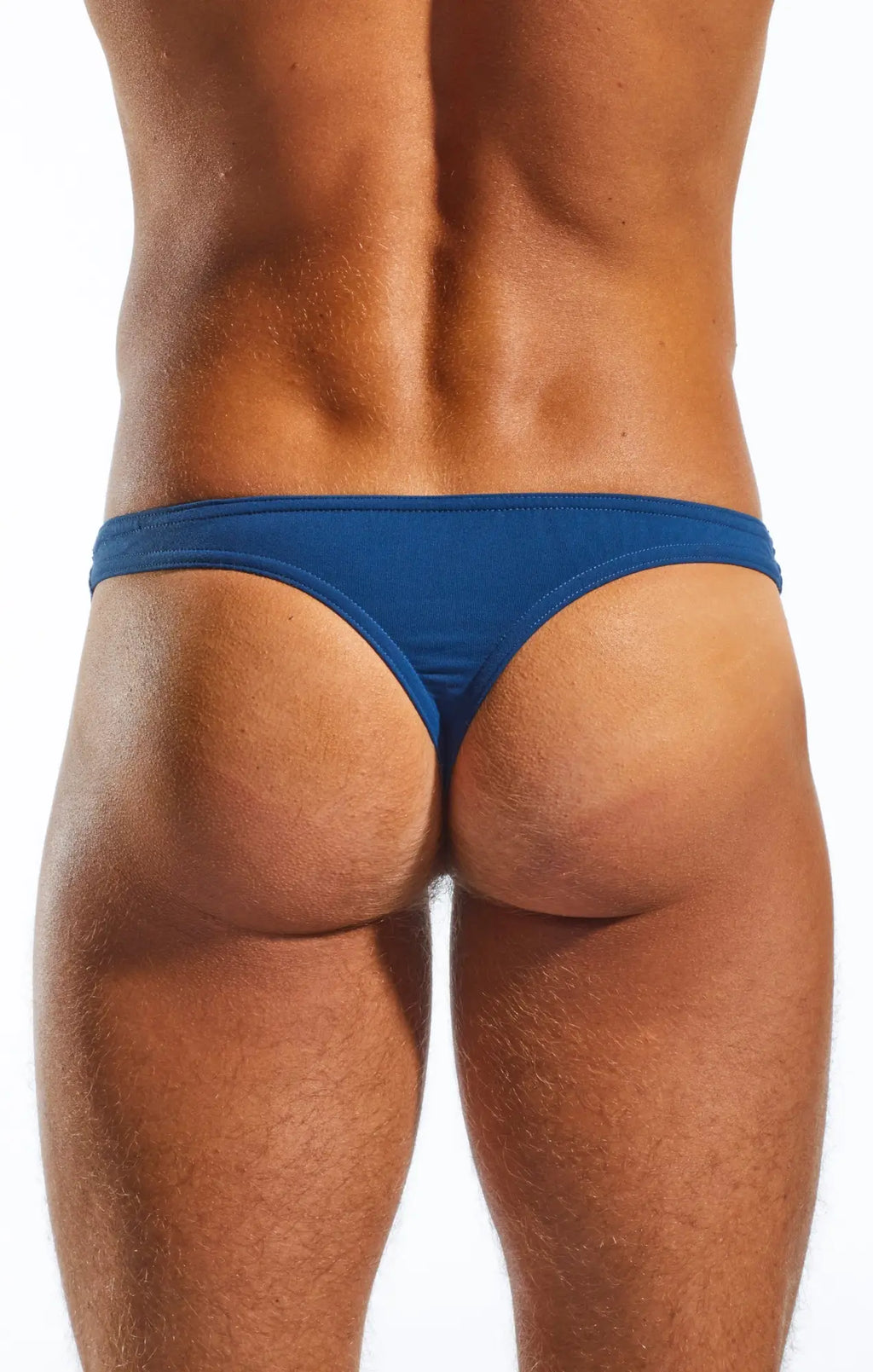 Blue Cocksox CX05 thong made of smooth stretchy fabric shown from the back side