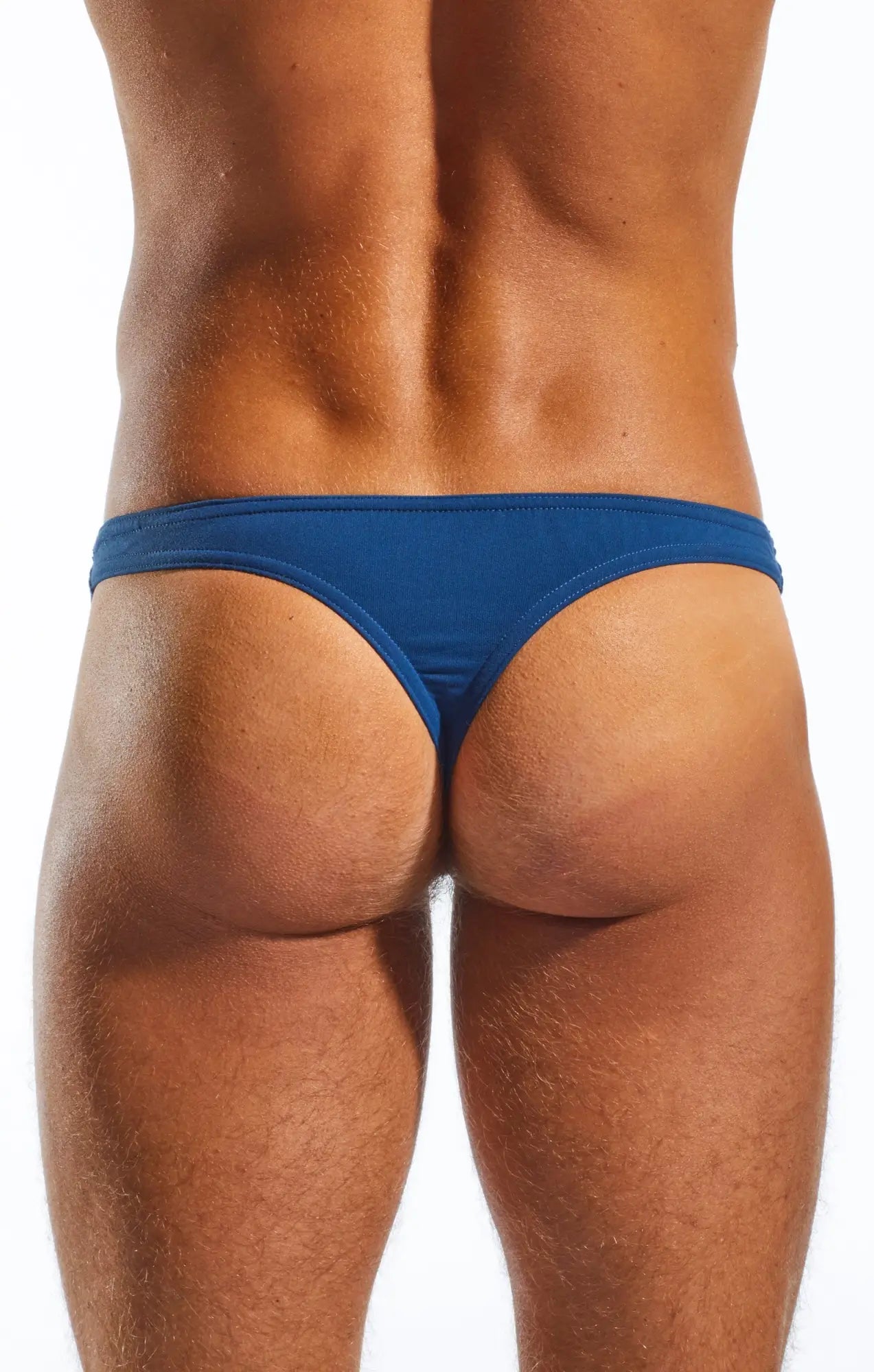 Blue Cocksox CX05 thong made of smooth stretchy fabric shown from the back side