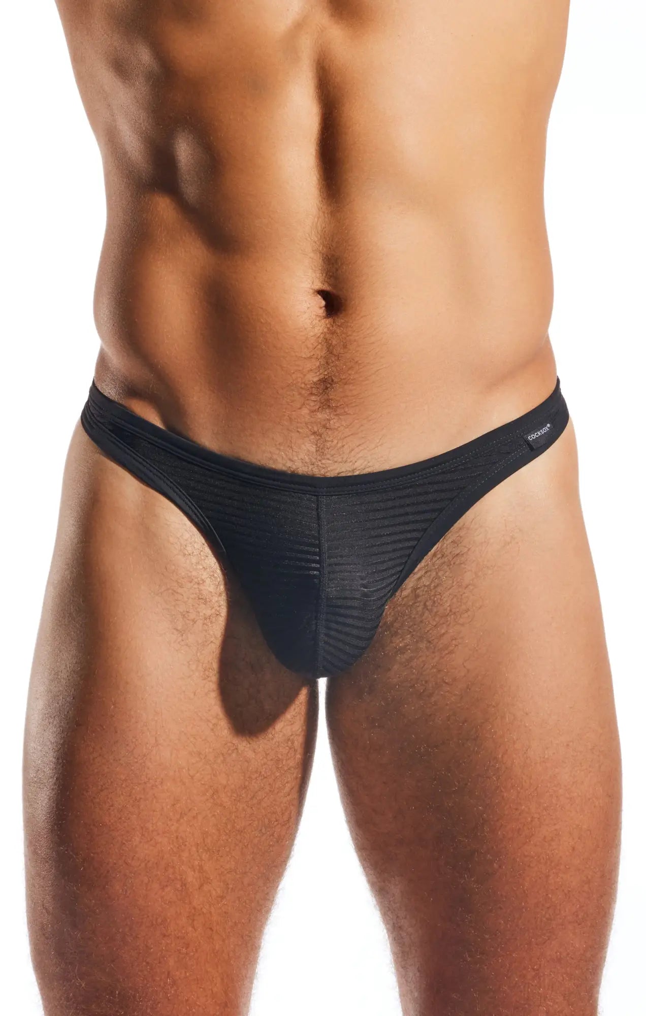 Black textured fabric Cocksox CX05LUX semi-sheer thong with sleek form-fitting design shown from the back