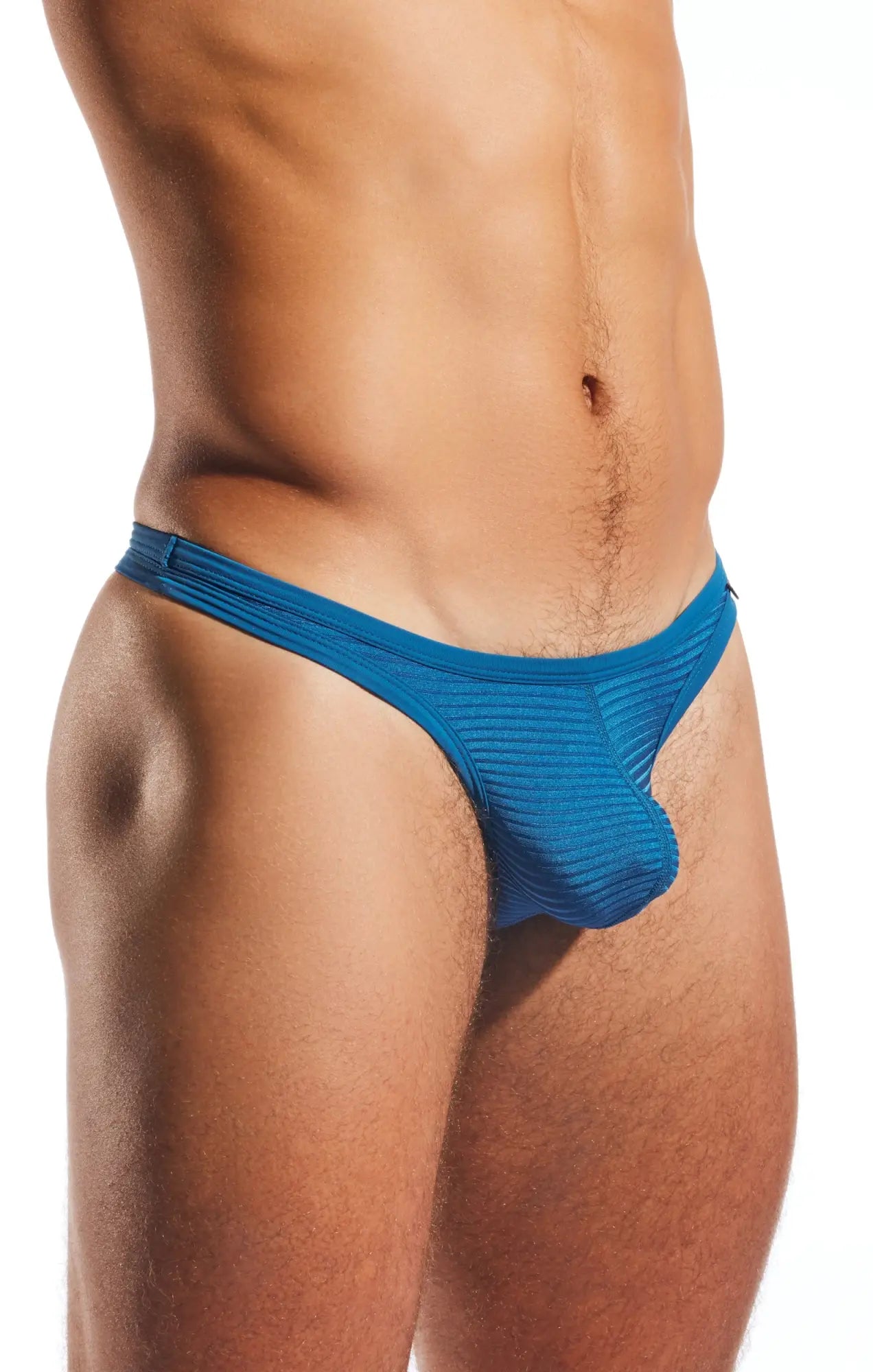 Cocksox cx05lux semi-sheer thong in blue ribbed fabric showing front view with breathable material