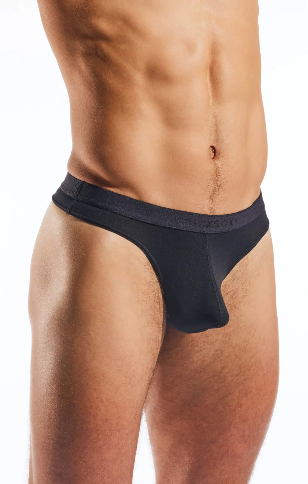 Black mens thong cocksox cx05md with smooth form-fitting fabric and subtle brand logo on the waistband