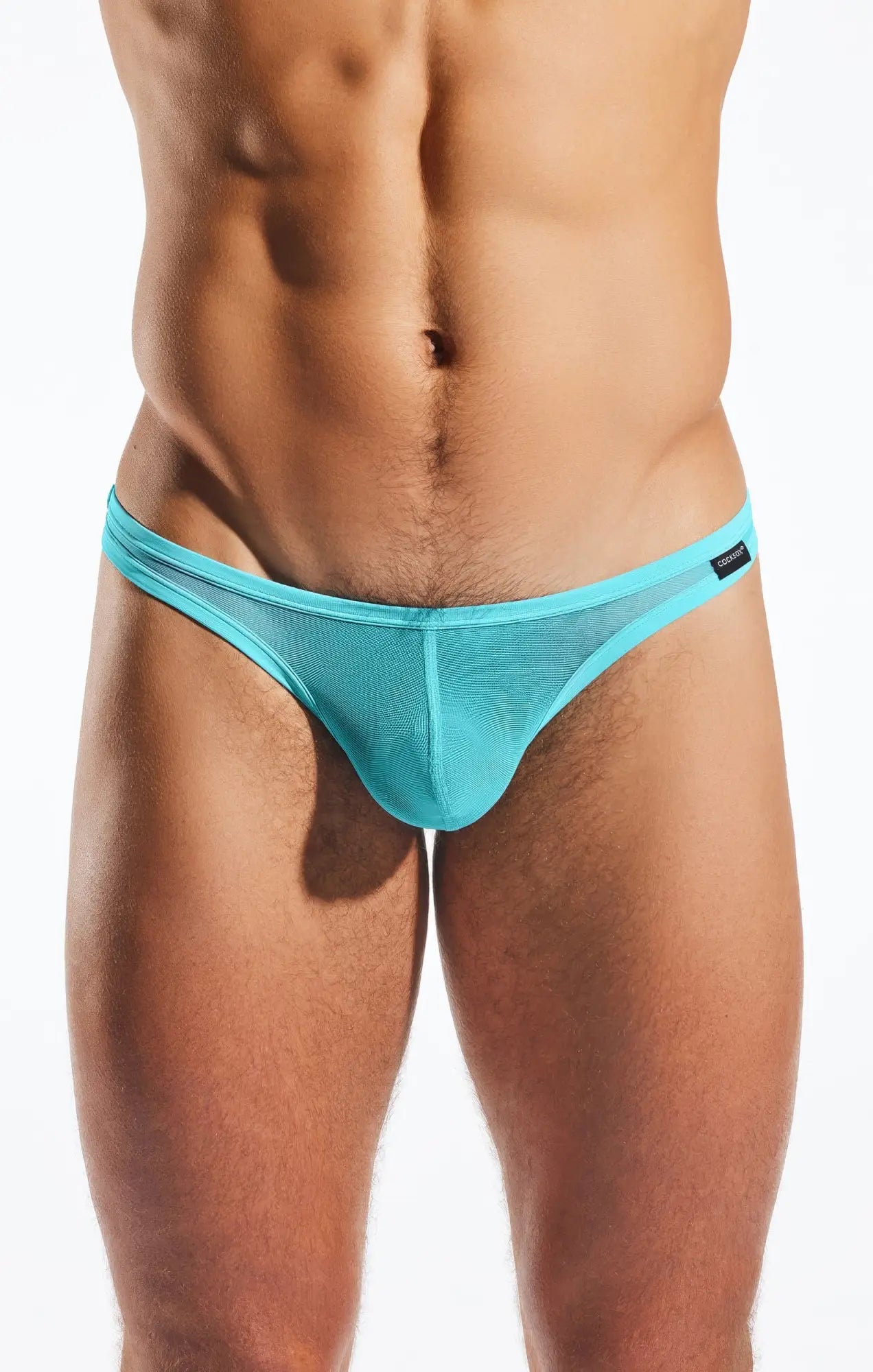 Cocksox cx05me mesh thong in turquoise features a sleek form-fitting design made from breathable mesh material