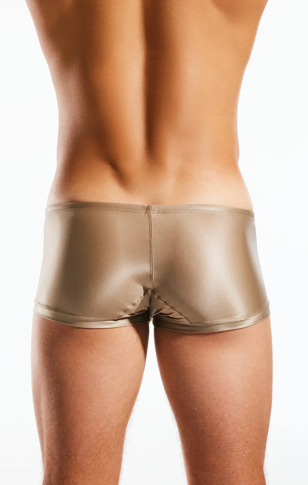 Shiny metallic gold cocksox cx08gs swim trunk briefs with sleek form-fitting design for swimwear use