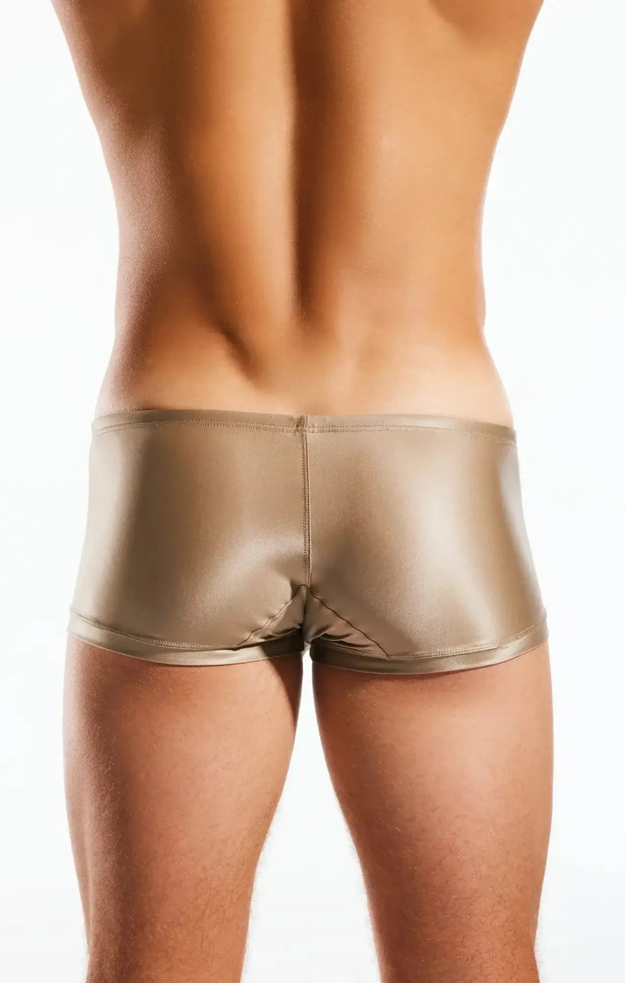 Shiny metallic gold cocksox cx08gs swim trunk briefs with sleek form-fitting design for swimwear use