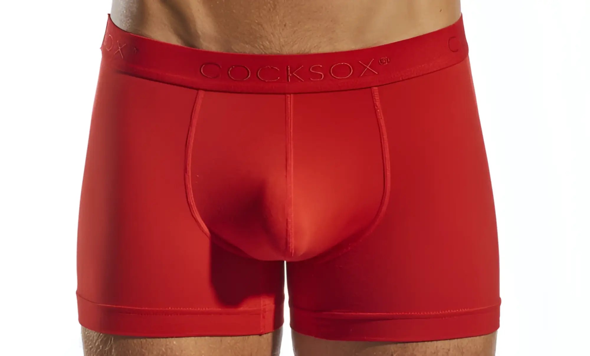 Red cocksock brand cx12 boxer briefs in smooth red fabric with form-fitting design and subtle stitching details