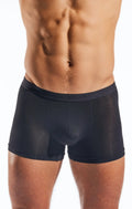 Black men’s Cocksox CX12MD boxer briefs with smooth, form-fitting design and brand name on waistband