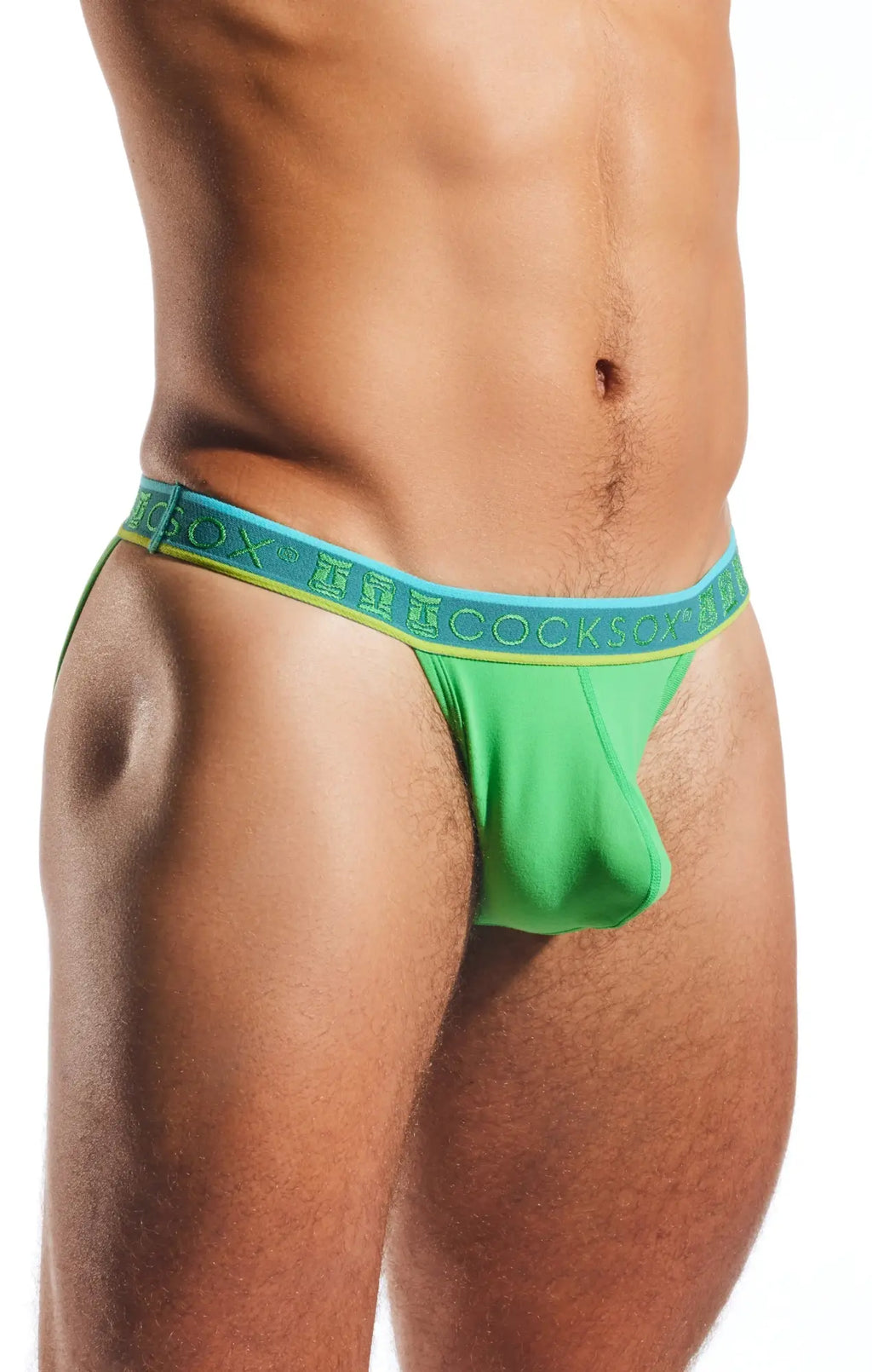 Green cocksox cx16n bikini brief with blue and yellow elastic waistband featuring cocksox branding
