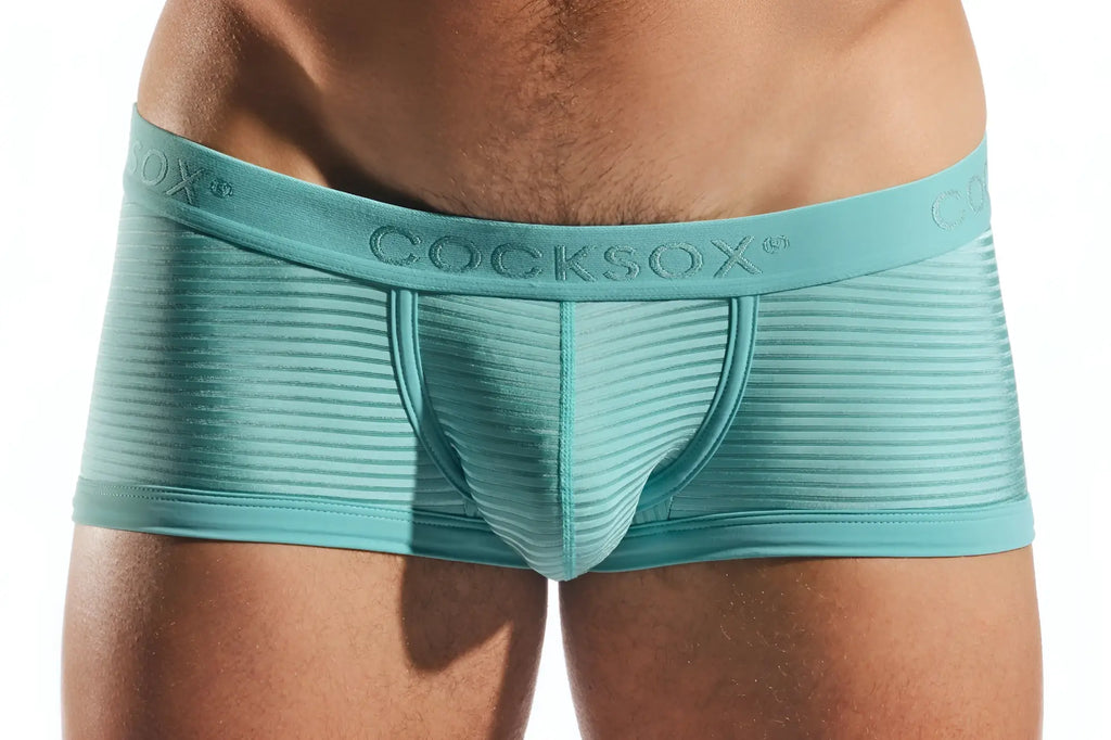 Teal ribbed men’s briefs with branded waistband from Cocksox CX68LUX semi-sheer trunk collection