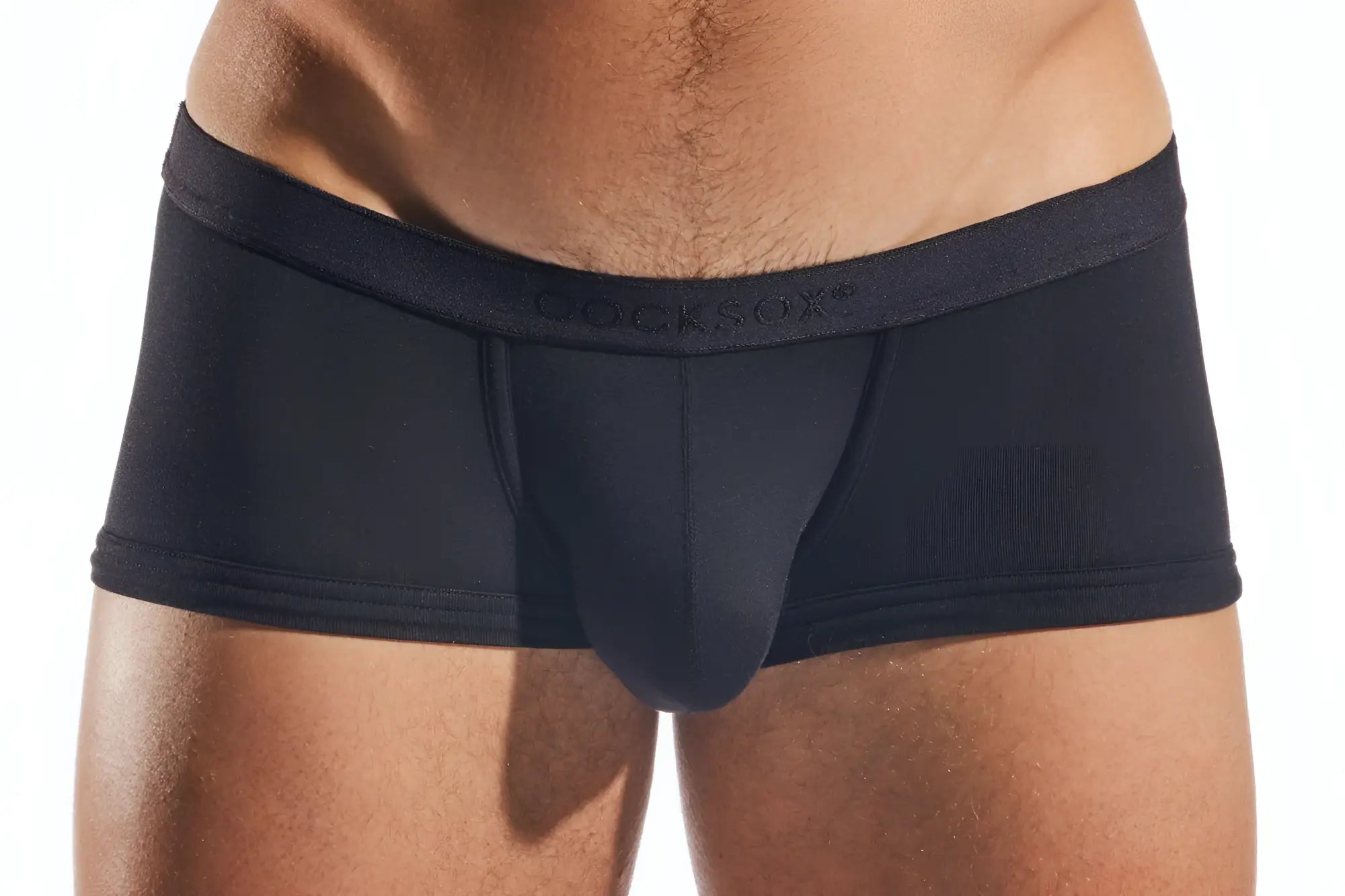 Black form-fitting mens briefs cocksox cx68md trunk with smooth elastic waistband featuring cocksoft brand name