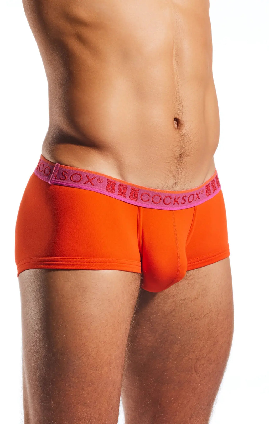 Bright orange cocksox cx68n trunk briefs with pink waistband featuring the brand logo for men