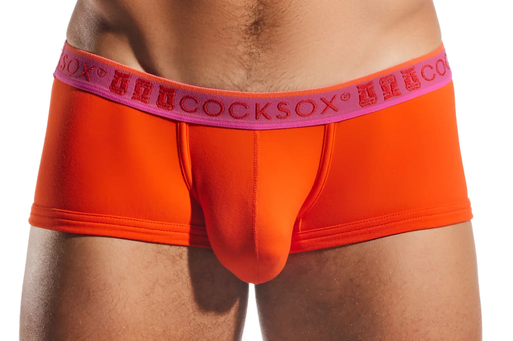 Bright orange men’s briefs with a pink waistband and cocksox brand name in red cocksox cx68n trunk