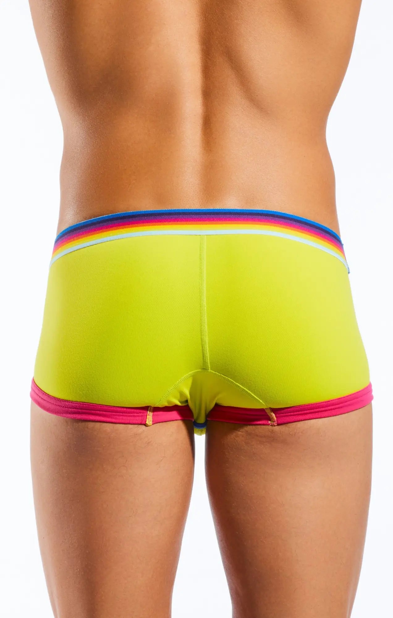 Vibrant lime green Cocksox cx68n trunk briefs with rainbow-striped waistband and pink trim