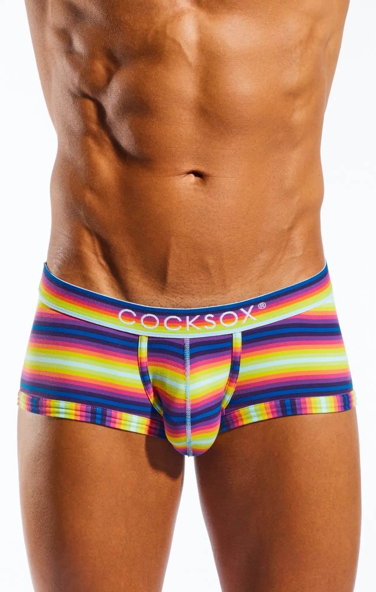 Vibrant rainbow-striped cocksox cx68n trunk briefs with bold colorful pattern and elastic waistband for men