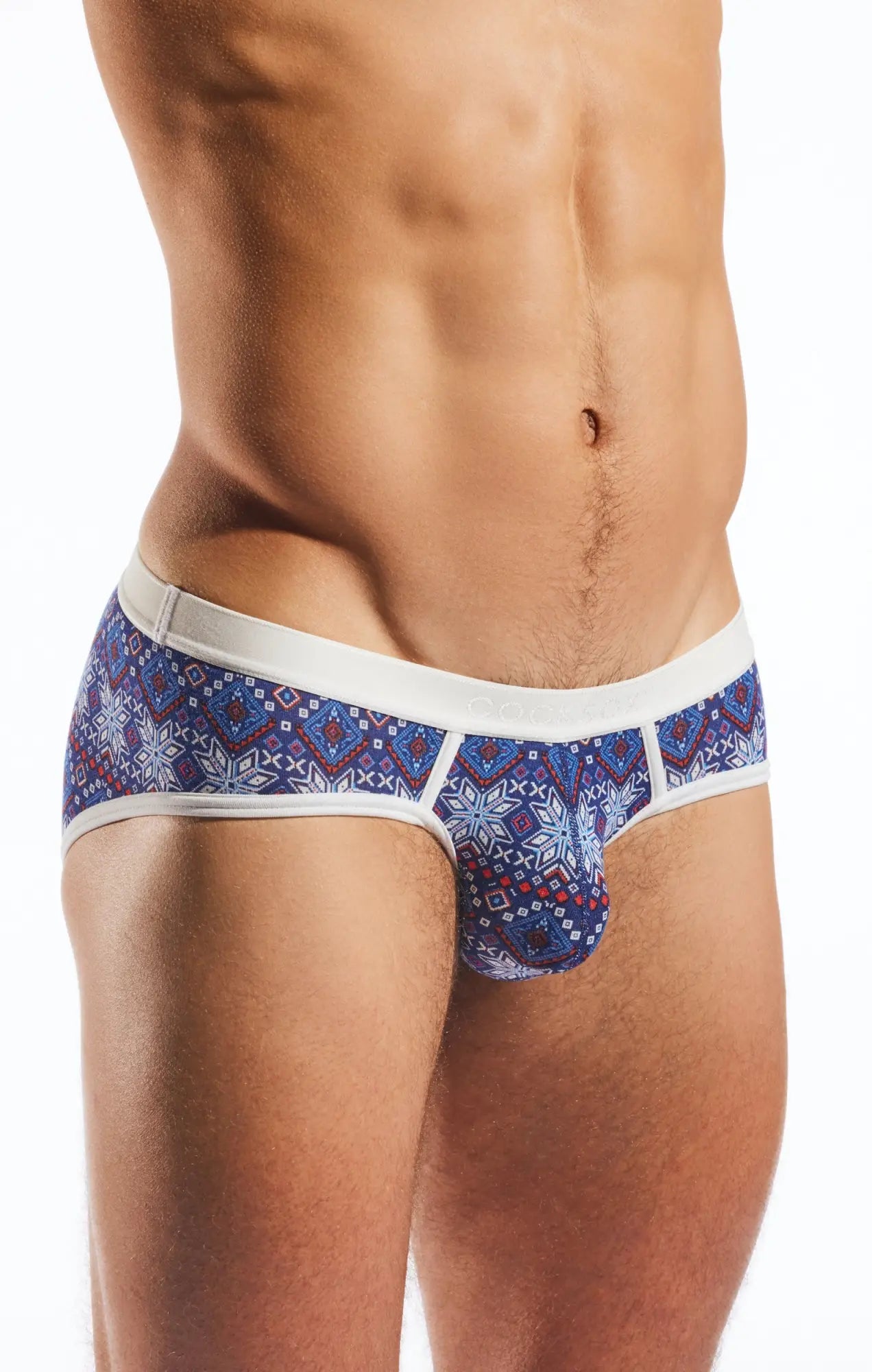 Blue patterned Cocksox CX76MD sports brief with white trim and snowflake design for comfortable men’s wear