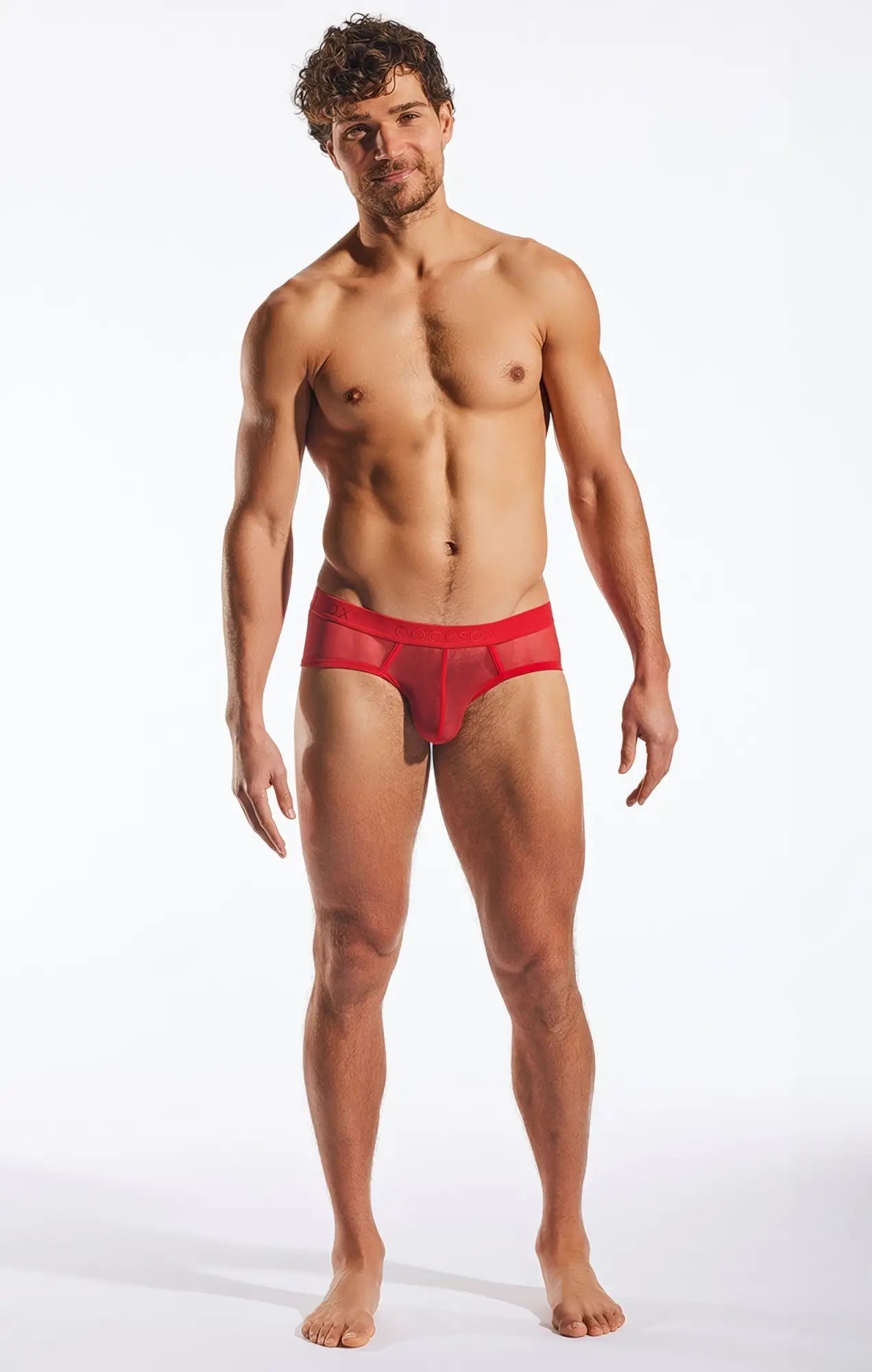 Red mesh sports briefs with a solid red waistband from Cocksox CX76ME designed for athletic support