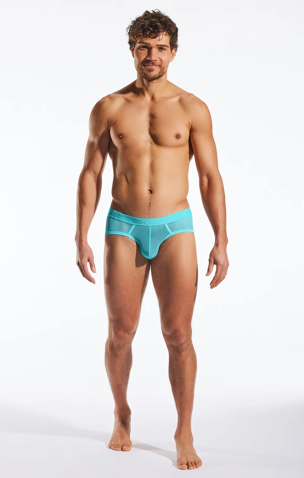 Turquoise mesh cocksox cx76me sports brief with sleek form-fitting design and bon brand on waistband