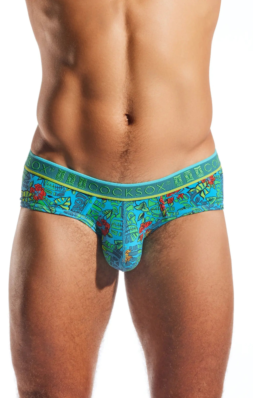 Cocksox cx76n sports brief featuring blue tropical-patterned men’s briefs with green and yellow trim for athletic wear