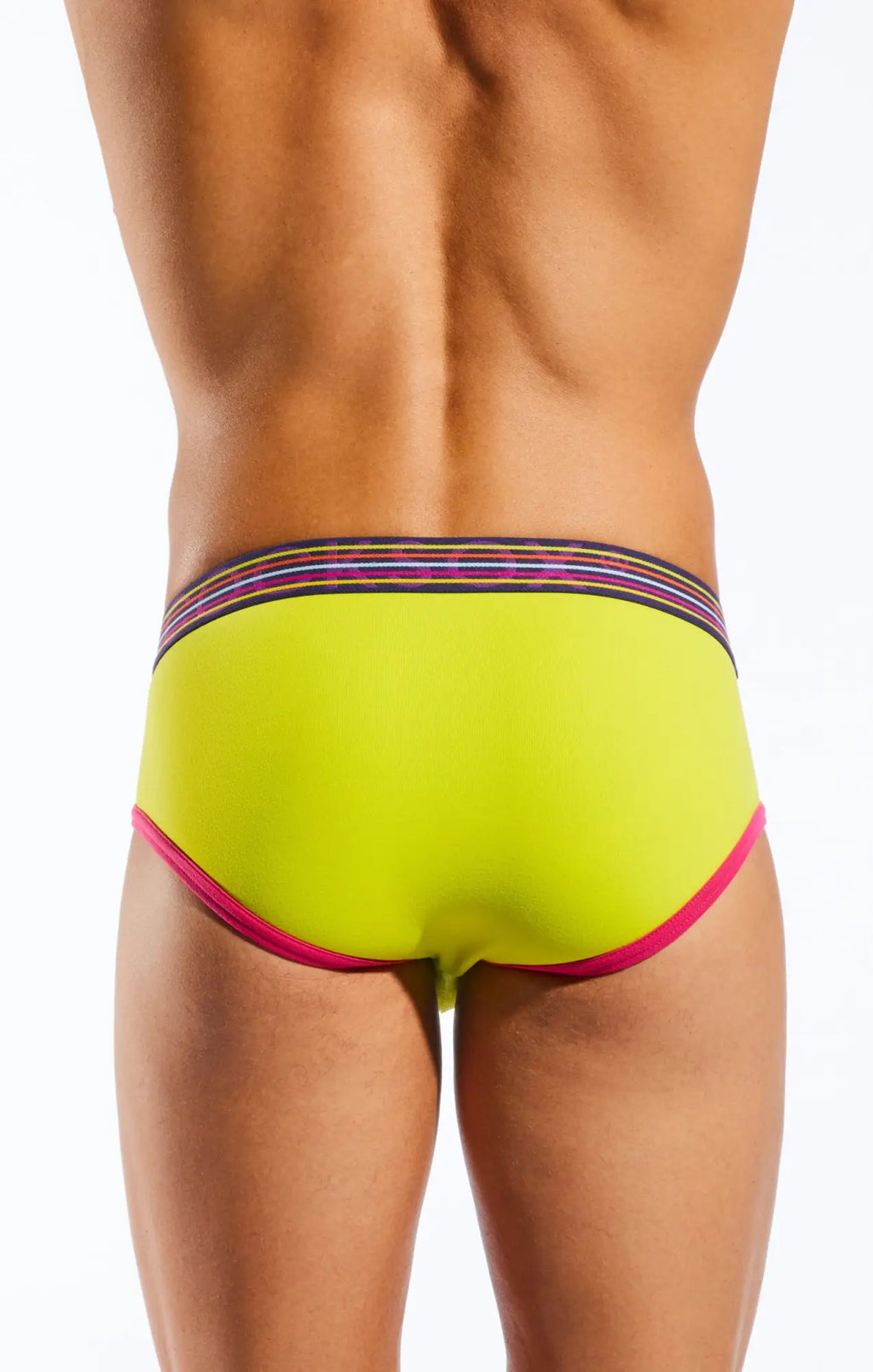 Bright neon green Cocksox CX76N sports brief swim trunks with pink trim and multicolored striped waistband