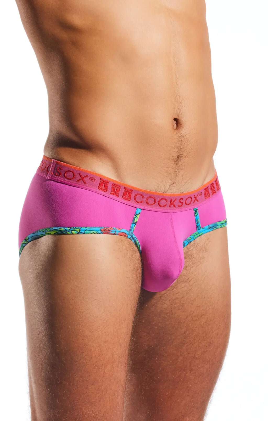 Vibrant pink cocksox cx76n sports brief with bold orange waistband and colorful patterned trim for men