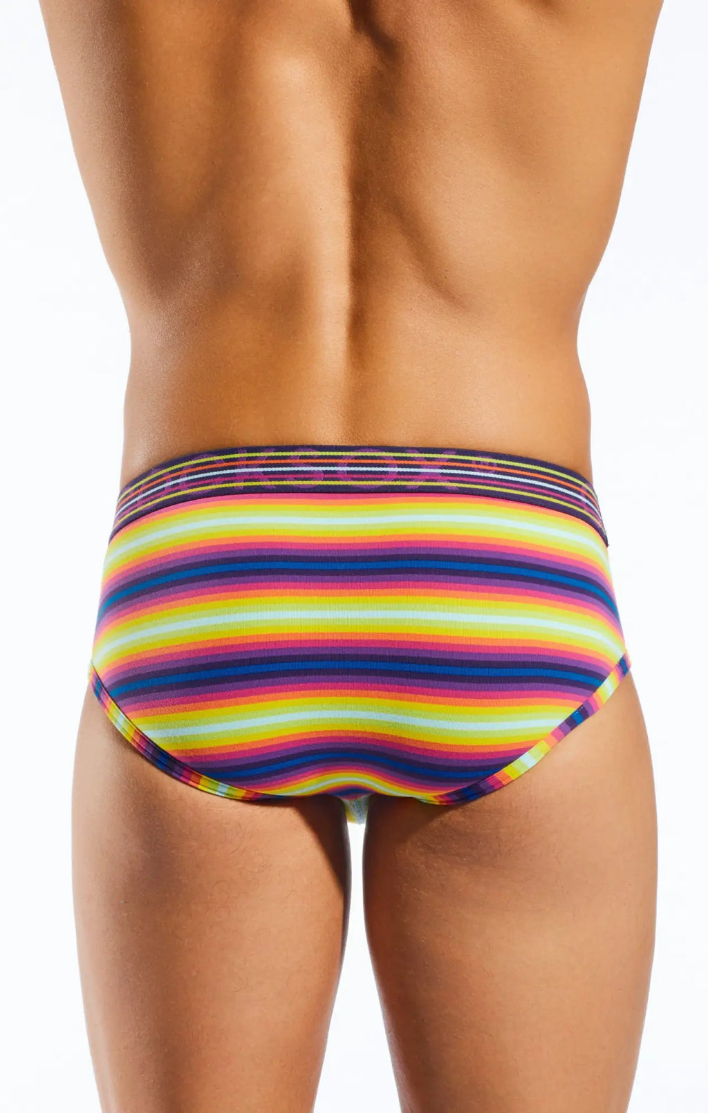 Cocksox cx76n sports brief featuring vibrant rainbow-striped fabric with a snug elastic waistband for support