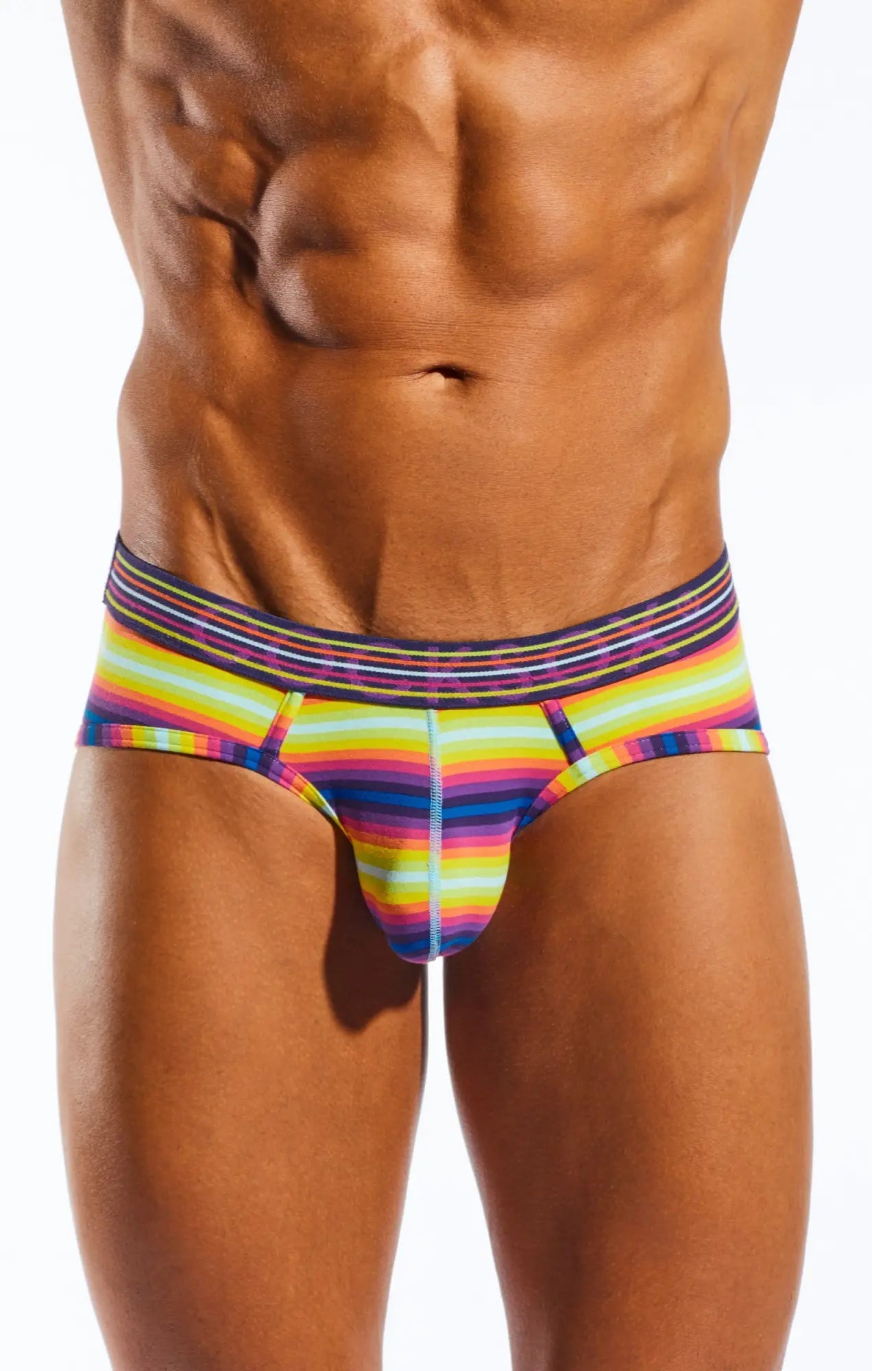 Vibrant rainbow-striped Cocksox CX76N sports briefs with a snug elastic waistband made from soft stretchy fabric